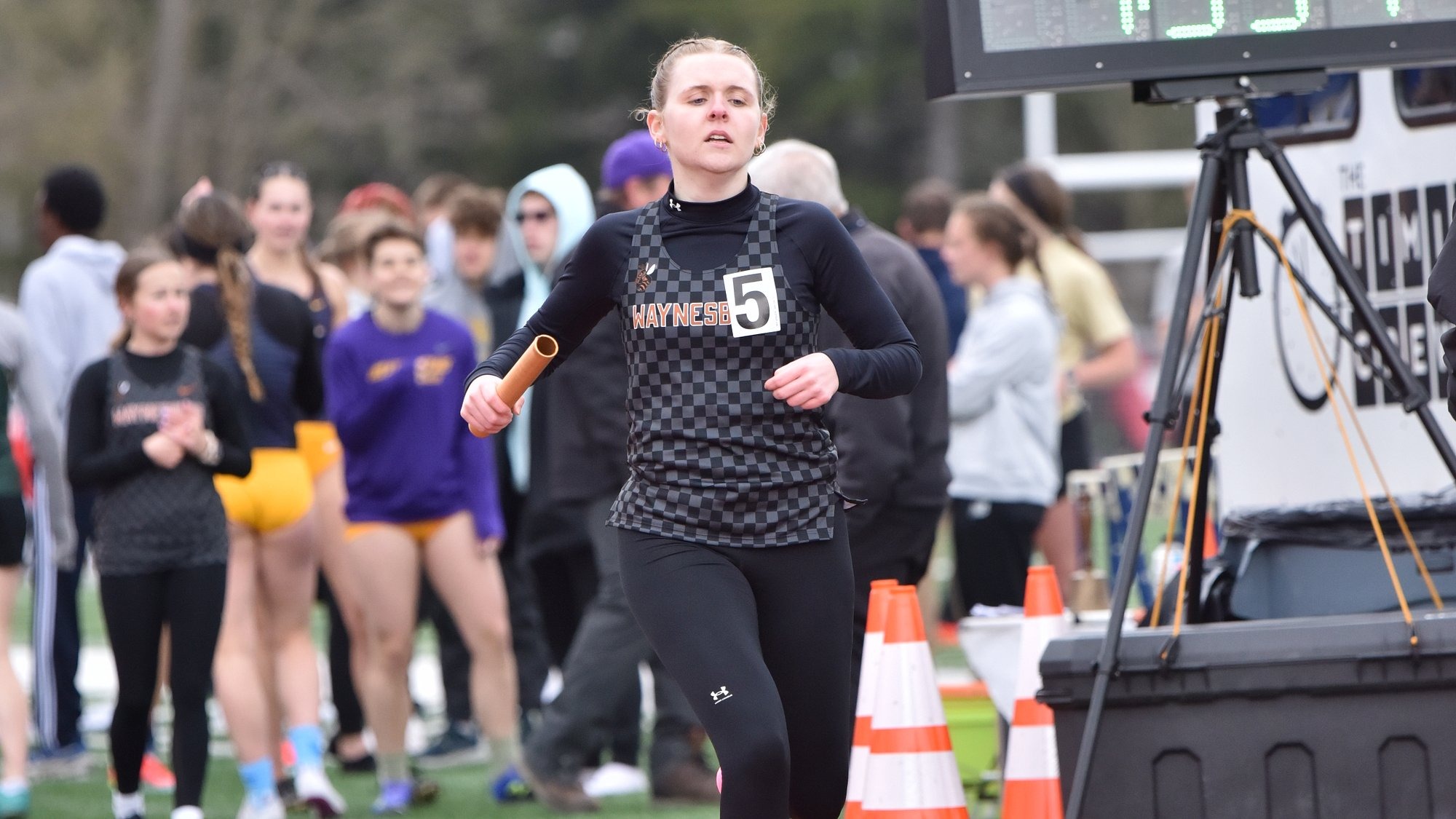 Ella Boothe running in a relay