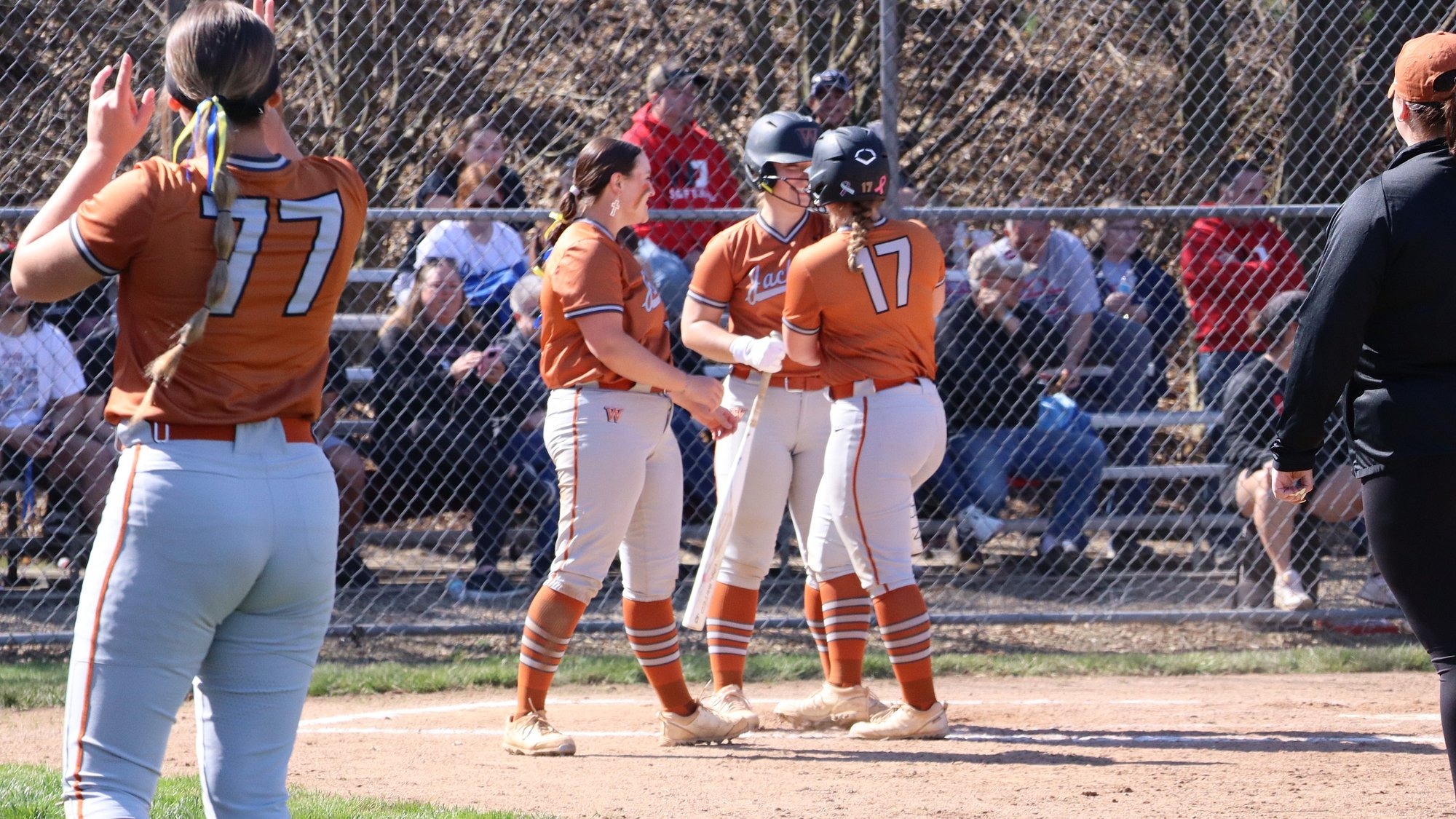 Waynesburg celebrates at the plate