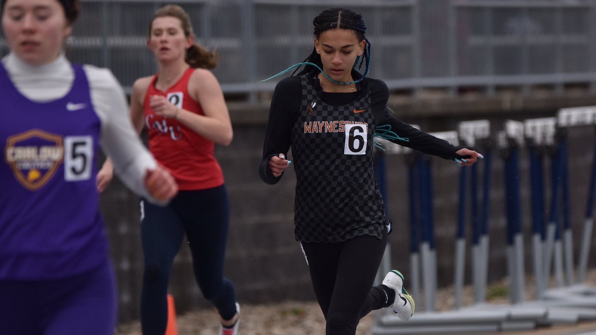 Ella Rishelle runs on the track