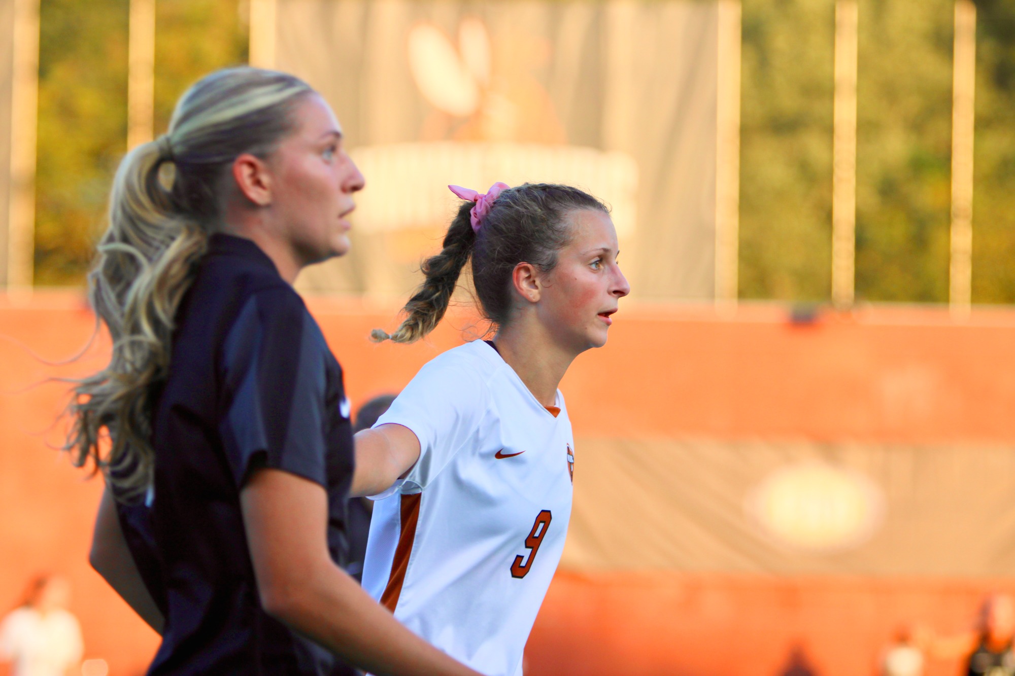 Hailey Gilchrest looking down the field. 