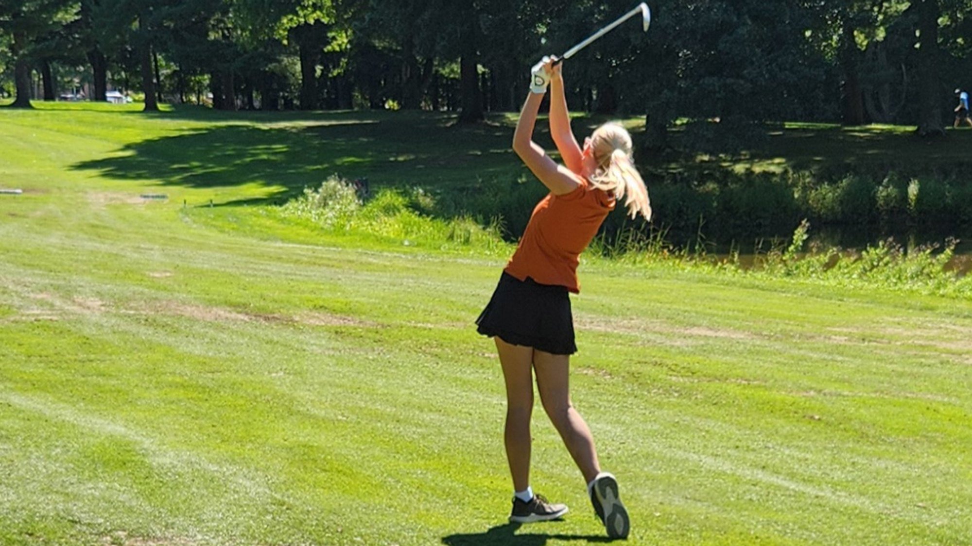 Waynesburg's Lexi Schmadel completes a swing at the Westminster Invitational