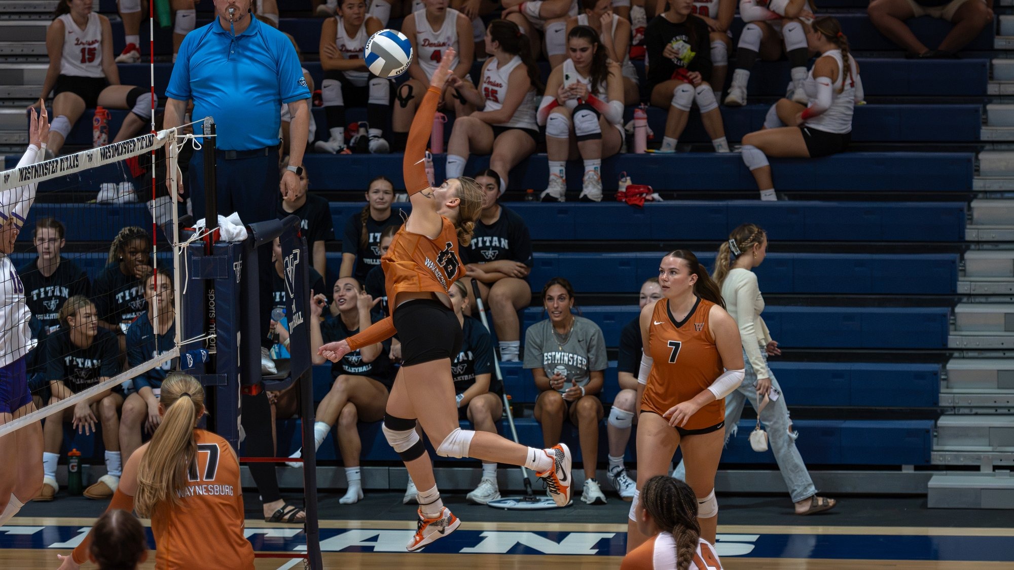 Kristina Zadrozny skys over the net to deliver a left handed kill attempt