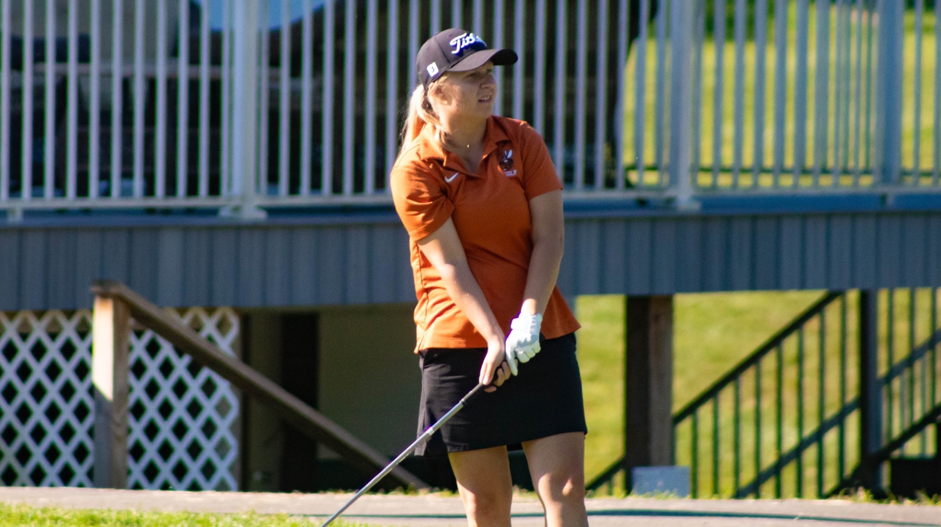 Autumn Bartos follows through on a golf shot at the Jacket Tri-Valley Classic