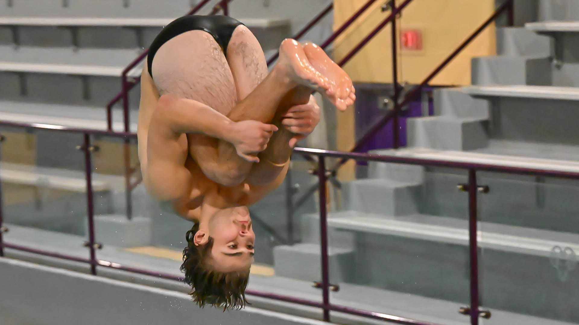Dominick Horning performs a tuck dive