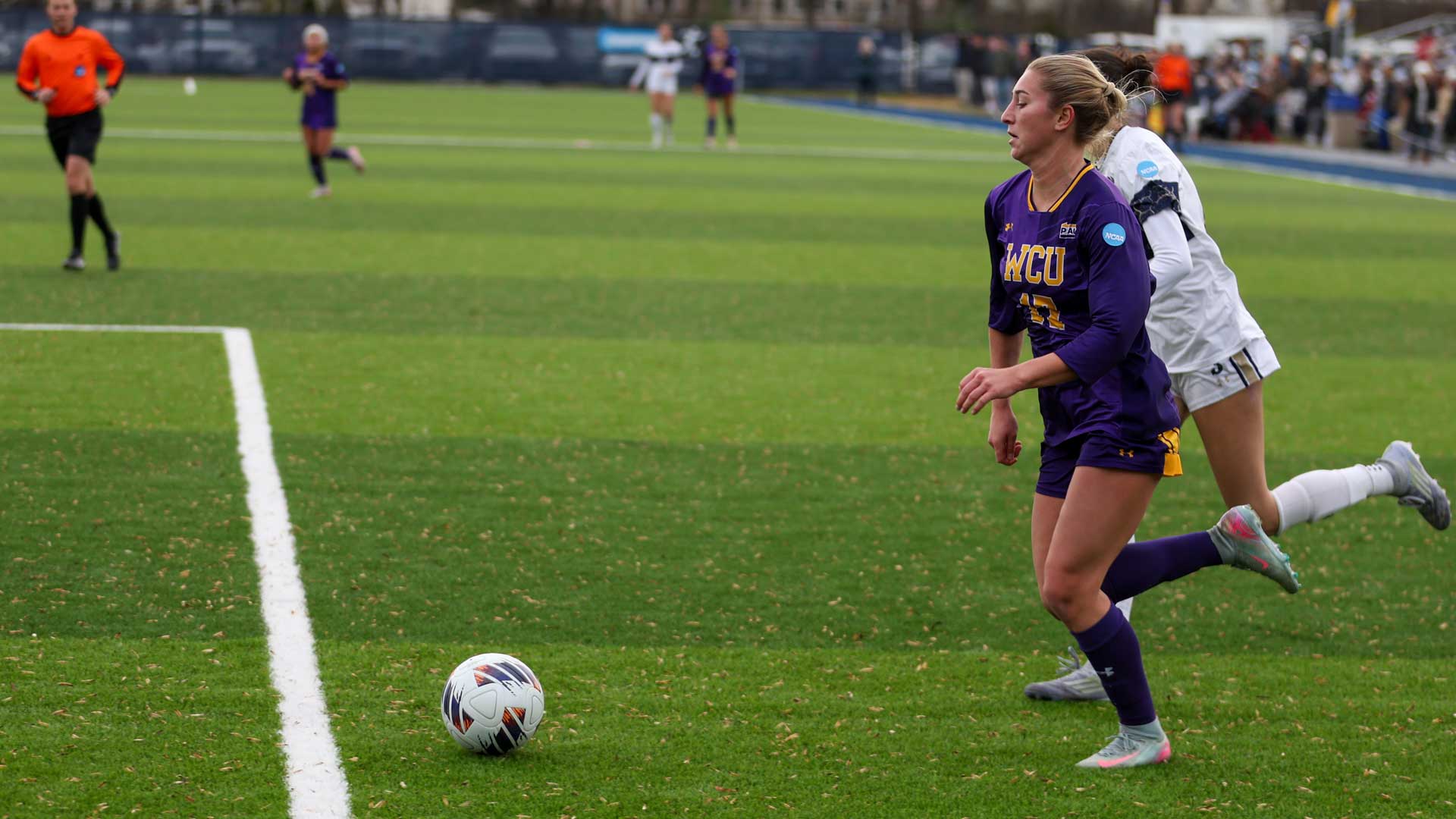 Adrianna Ryder carries the ball along the end line into the box at Shepherd