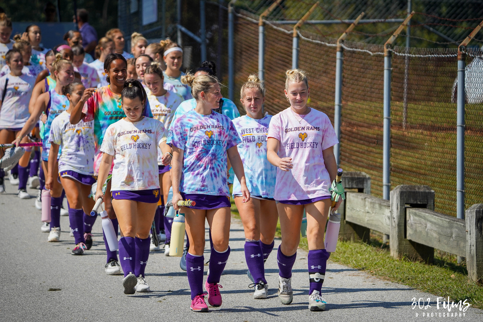 Field Hockey walking down the ramp to the field