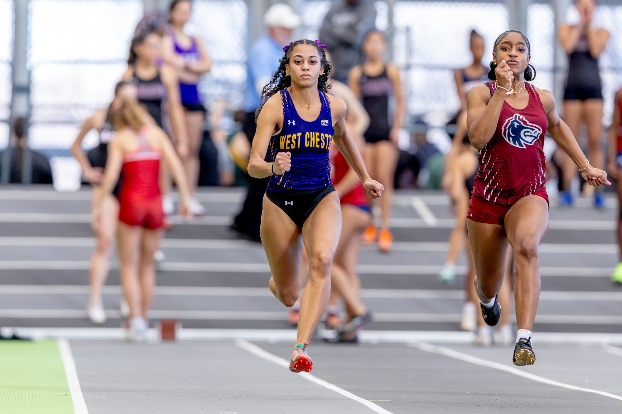 Women's Indoor Track and Field woman running