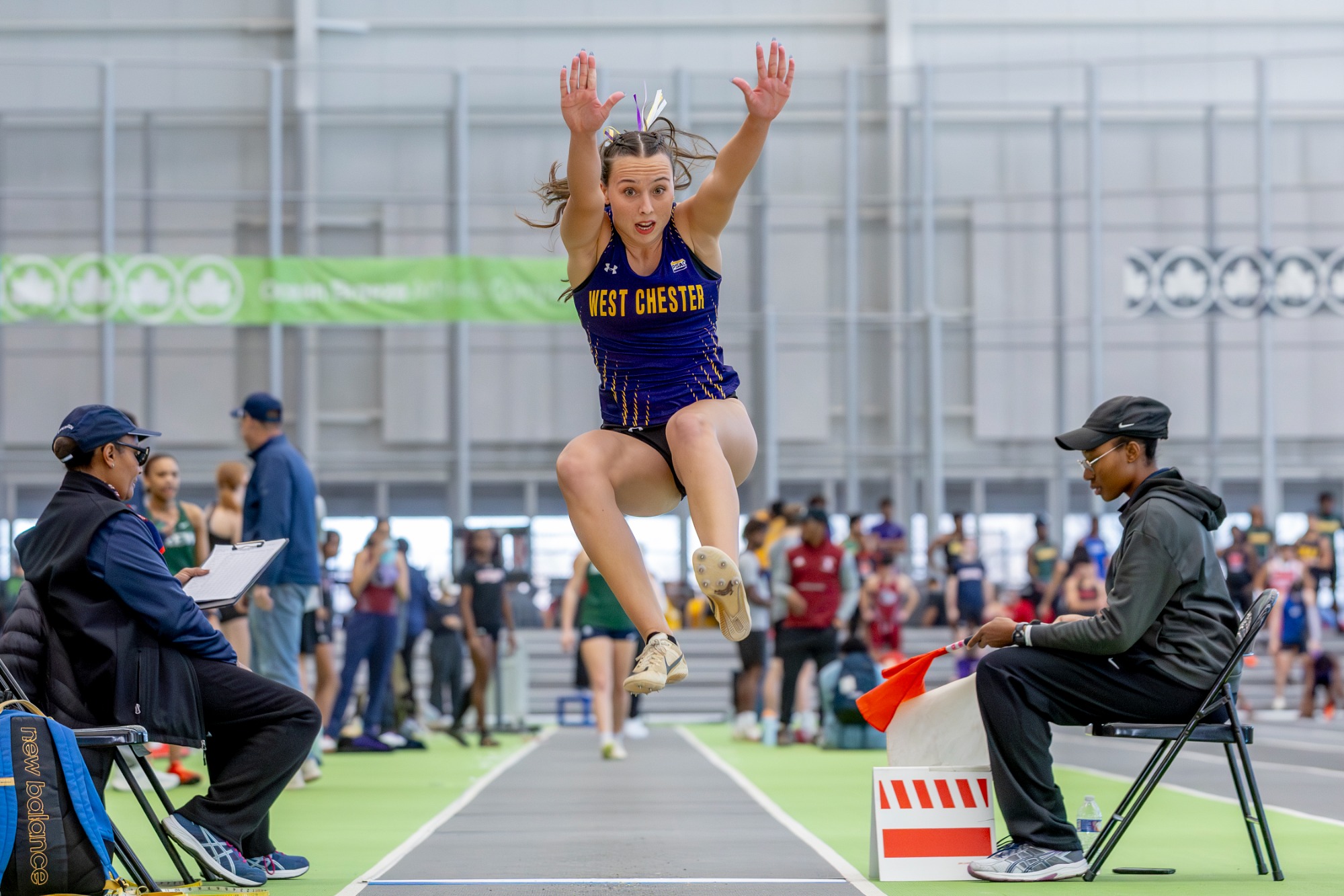 Womens Indoor Track and Field woman jumping