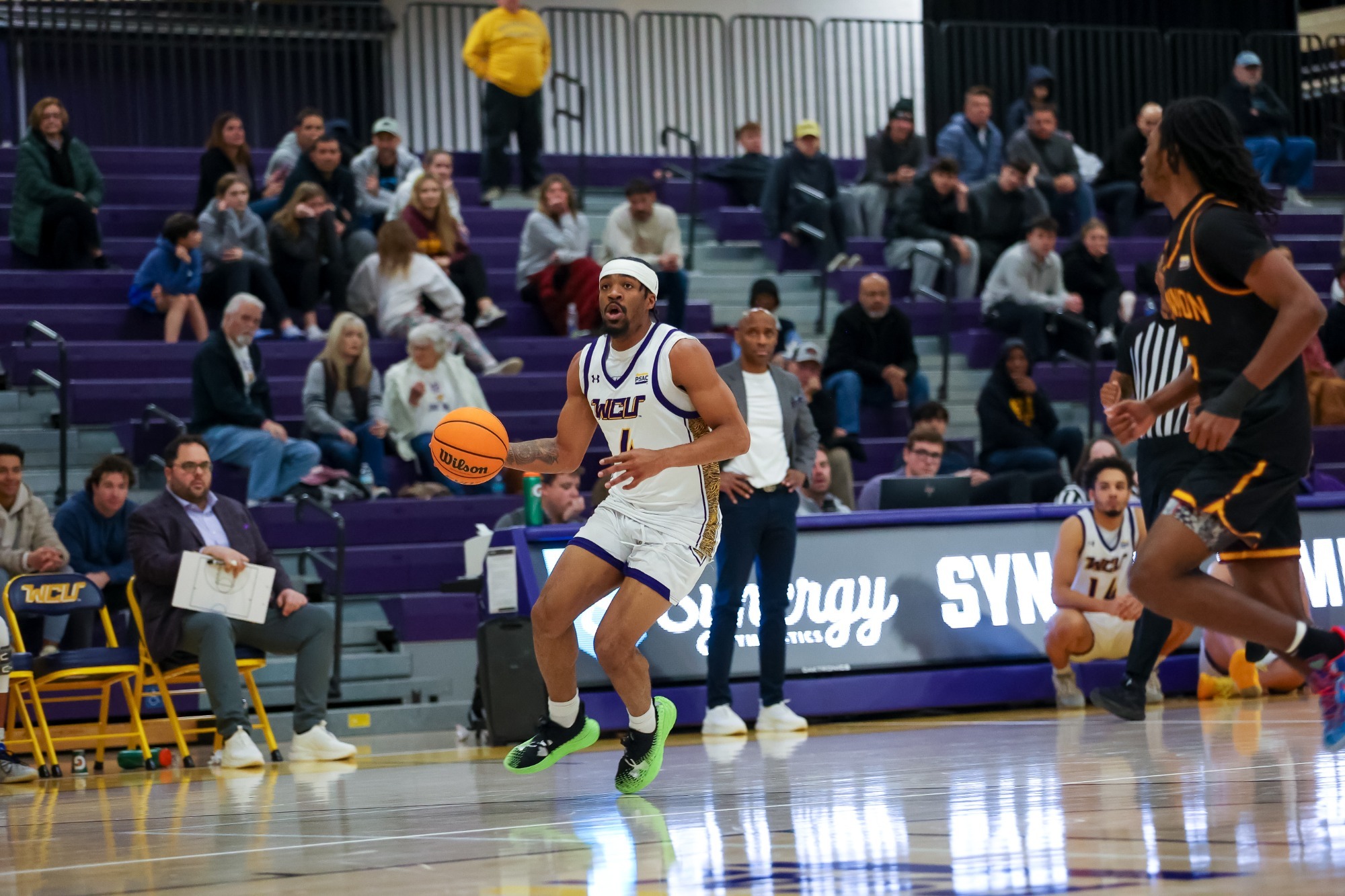Dinari Boykin Carries the ball up court vs Gannon SY