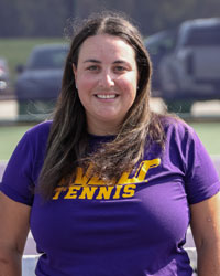 HEADSHOT OF CLAIRE UHLE  IN PURPLE WEST CHESTER TENNIS T SHIRT WITH WINDSCREEN BEHIND