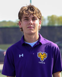 headshot of felix weber wearing purple wcu tennis polo