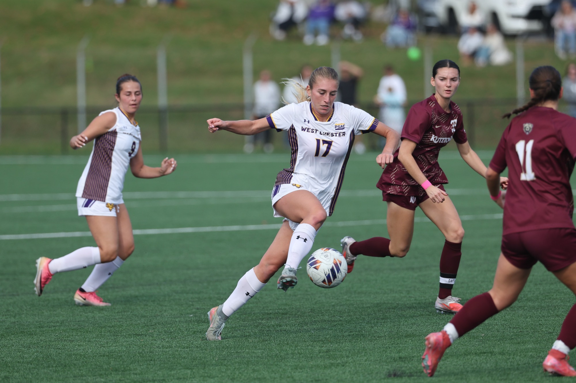 ADRIANARYDER CONTROLS THE BALL AGAINST A PAIR OF KUTZTOWN DEFENDERS IN REGULAR SEASON FINALE ON WEDNESDAY AFTERNOON ON ROCKWLEL FIELD