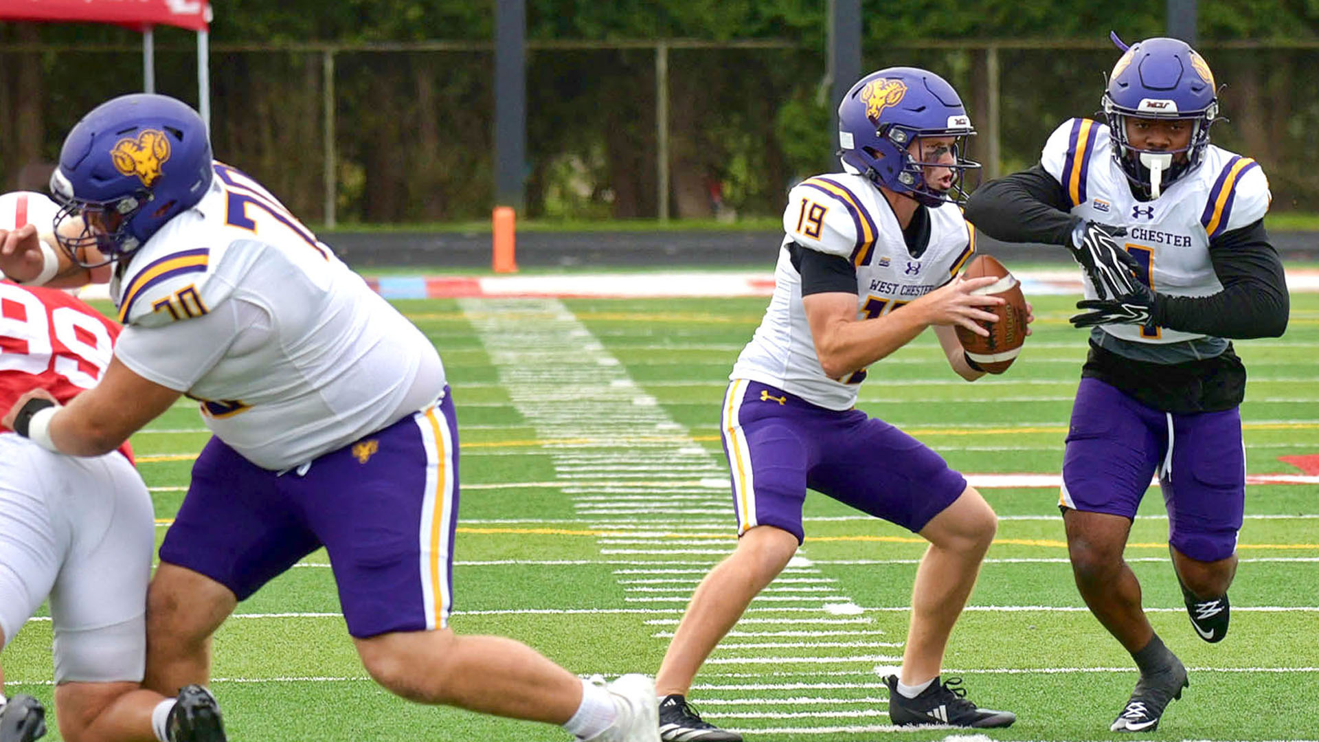 Future Robertson receives a hand off from QB Colin O'Sullivan in a game at Edinboro