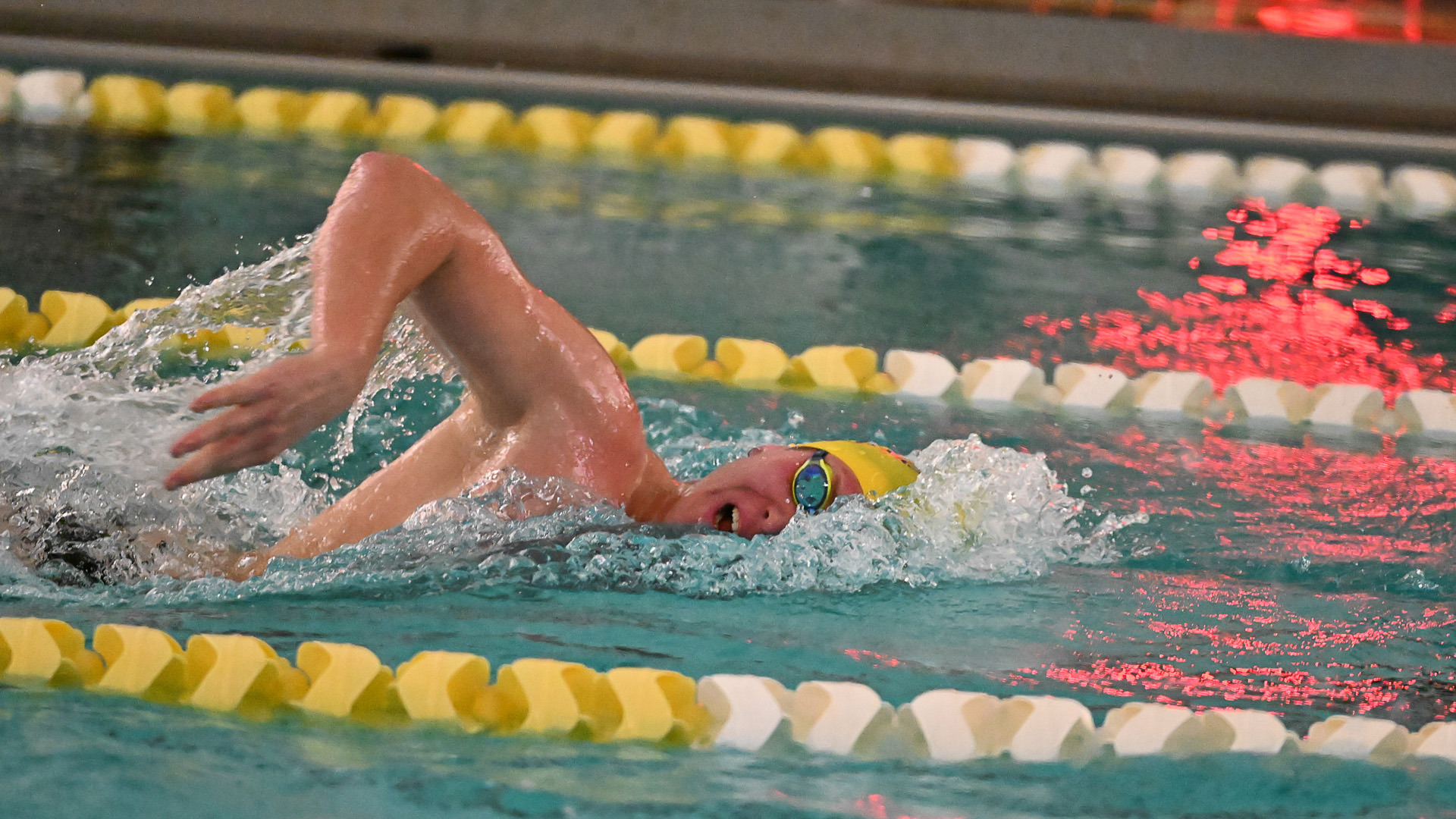 Marti Rosell Diez swims the freestyle in goggles and a yell TYR cap