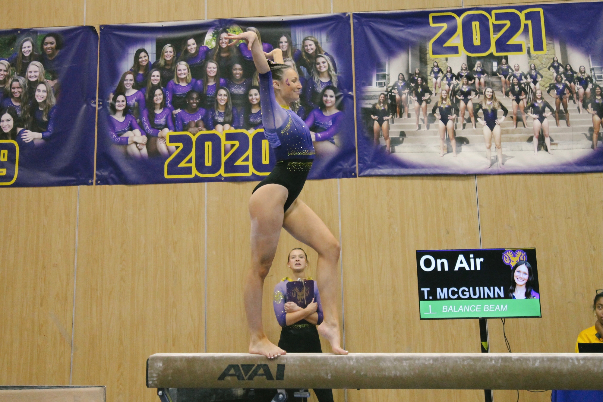 Tatum McGuinn competes on the balance beam in Sturzebecker Health Science Center