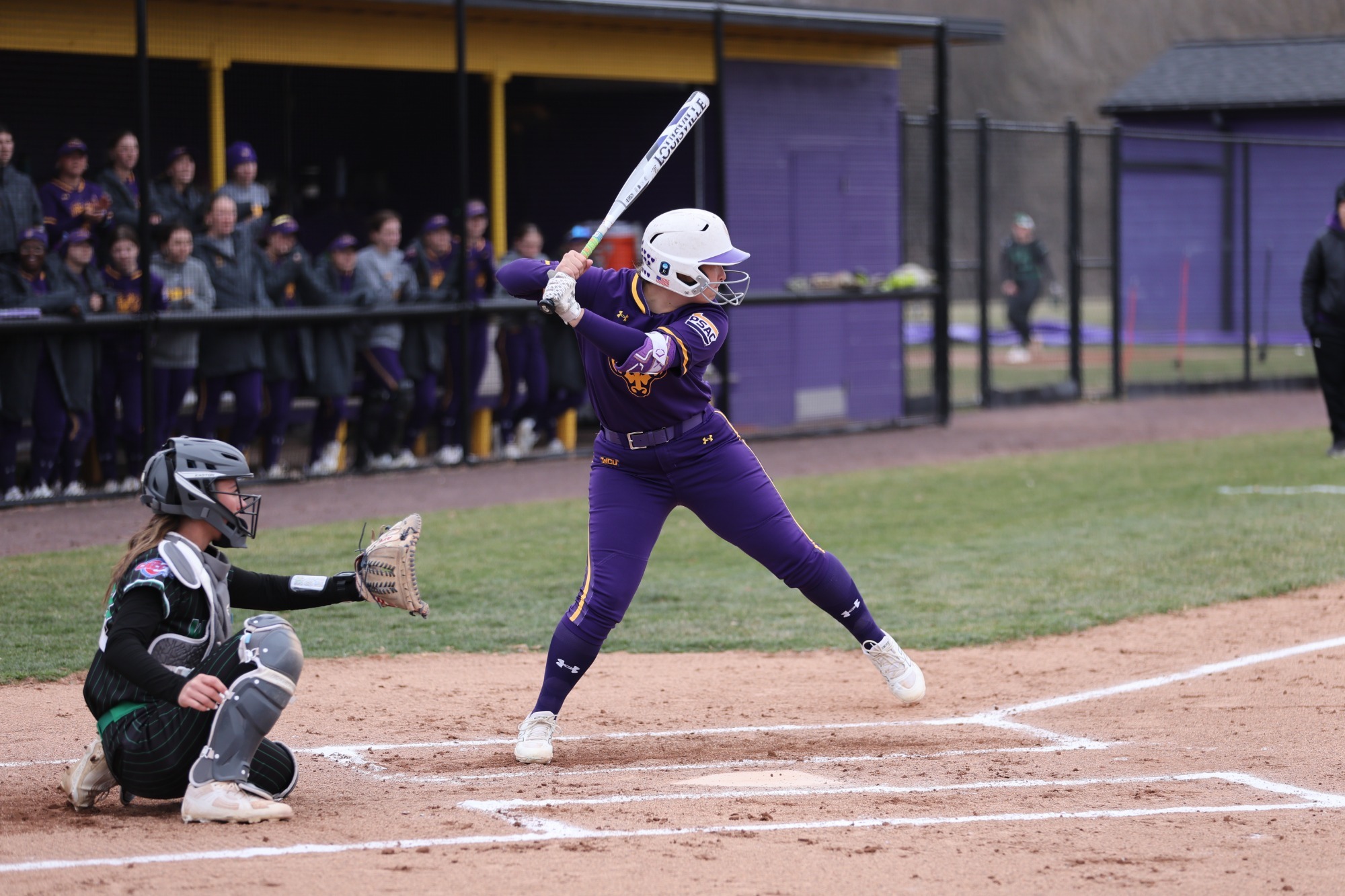 Paige Marabell in home purple uniforms vs Wilmington on 3-15-26