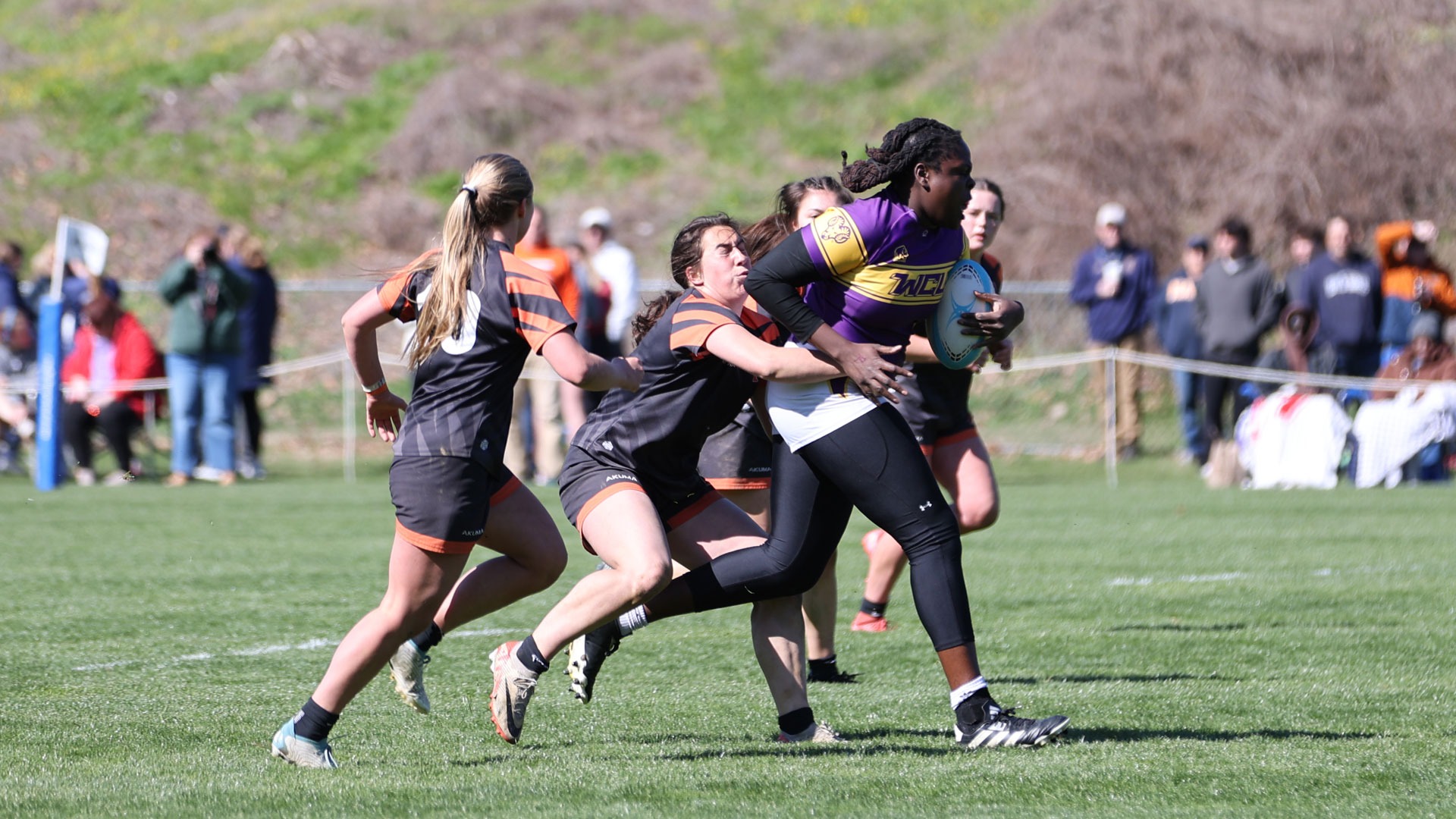 Christelle Adikpeto running vs princeton at WCU 7s wearing purple and white home uniform