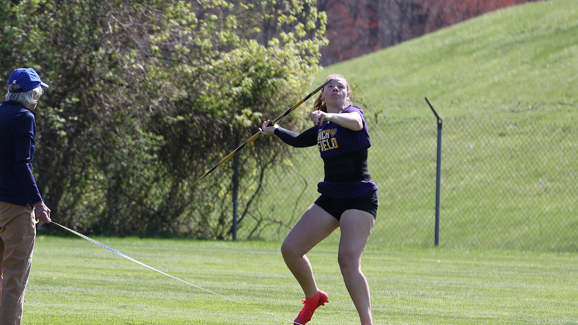 Kendall Thompson throws the javelin at a home meet