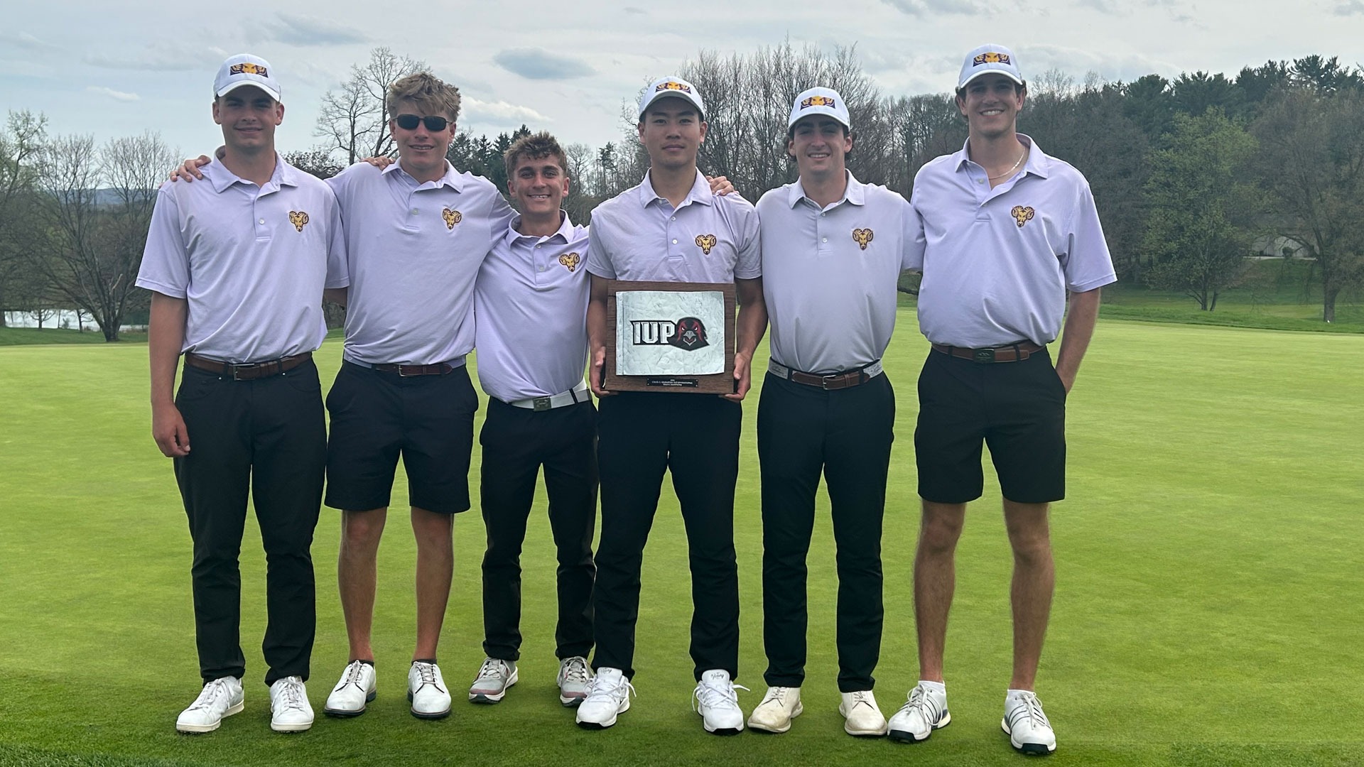 Men's Golf Team with Cecil C. Spadafora Team Invitational trophy