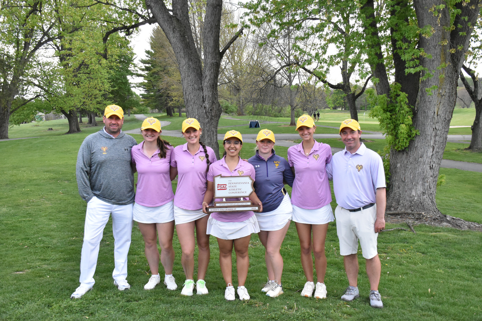WCU's Women's Golf team poses with its second place trophy at the PSAC Championships