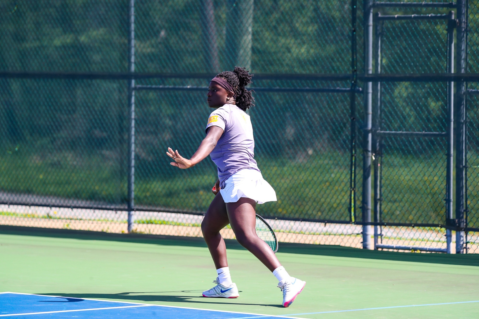 Felicia Manful returns a shot in PSAC Quarterfinals at Slippery Rock on Monday, April 27