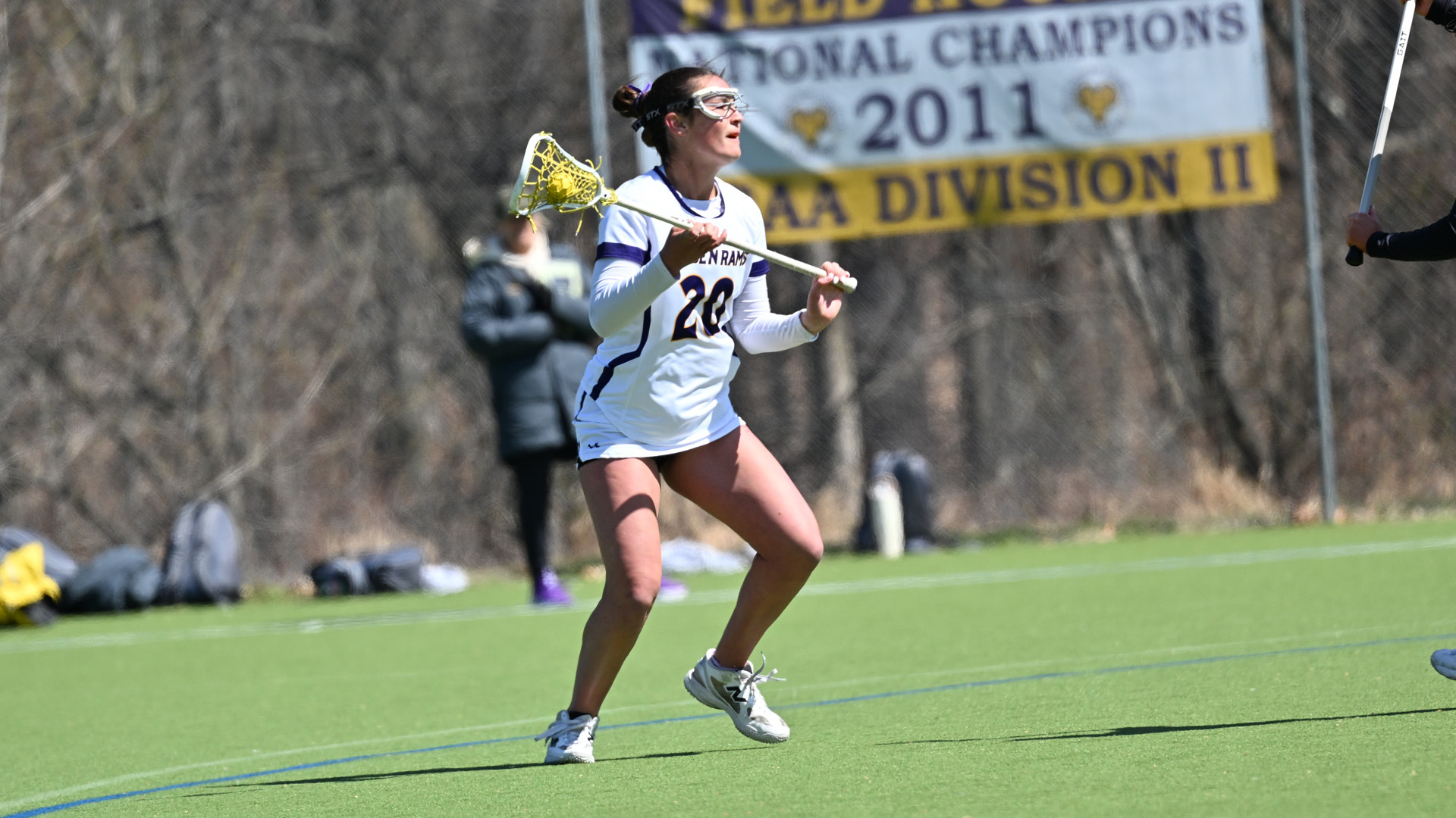 Avery Roberts looks to pass up top on the offense against Bloomsburg