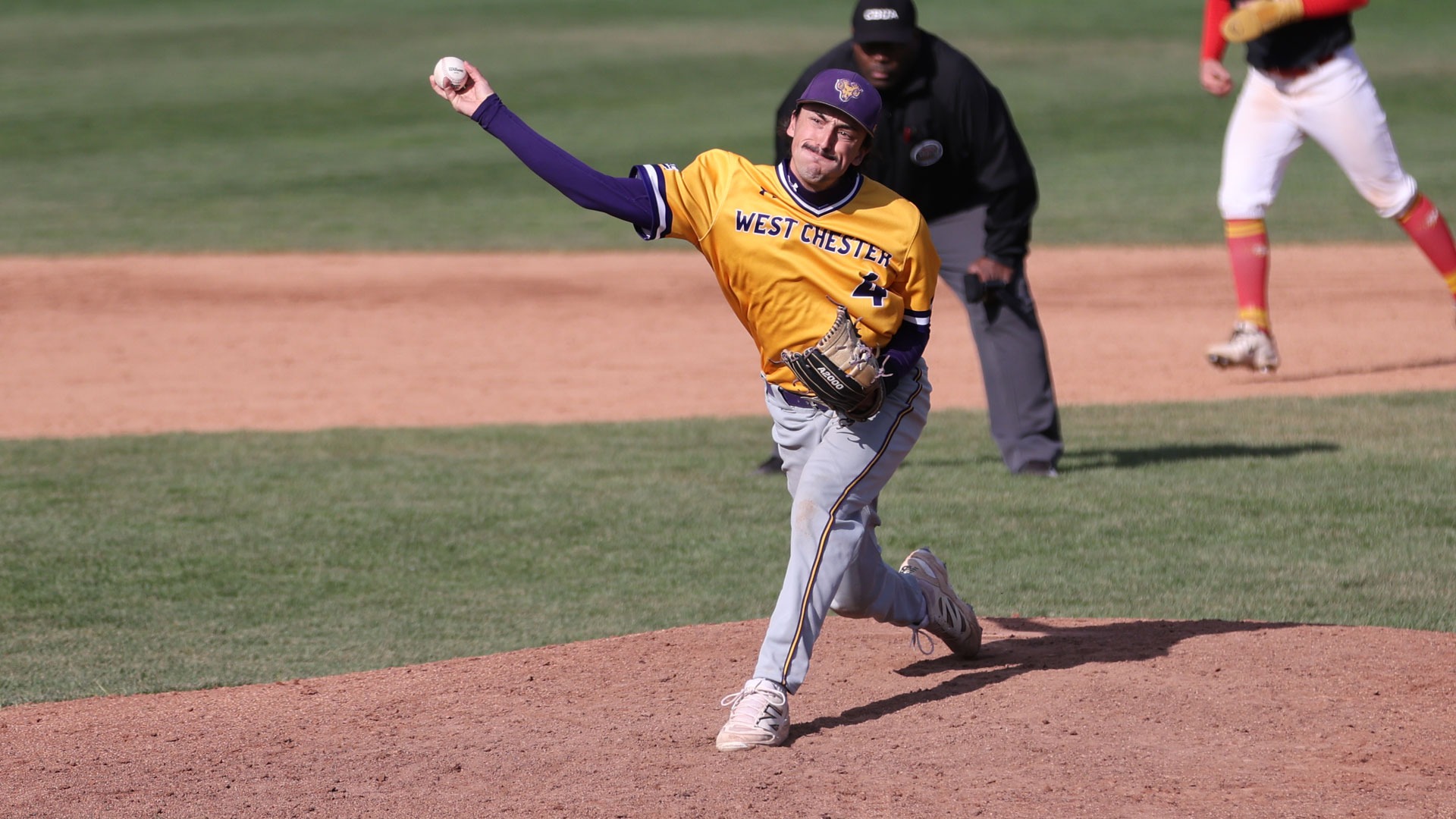 Evan Wineburg pitching vs Chestnut Hill in new gold top and gray pants on Monday, April 6 at Serpico Stadium