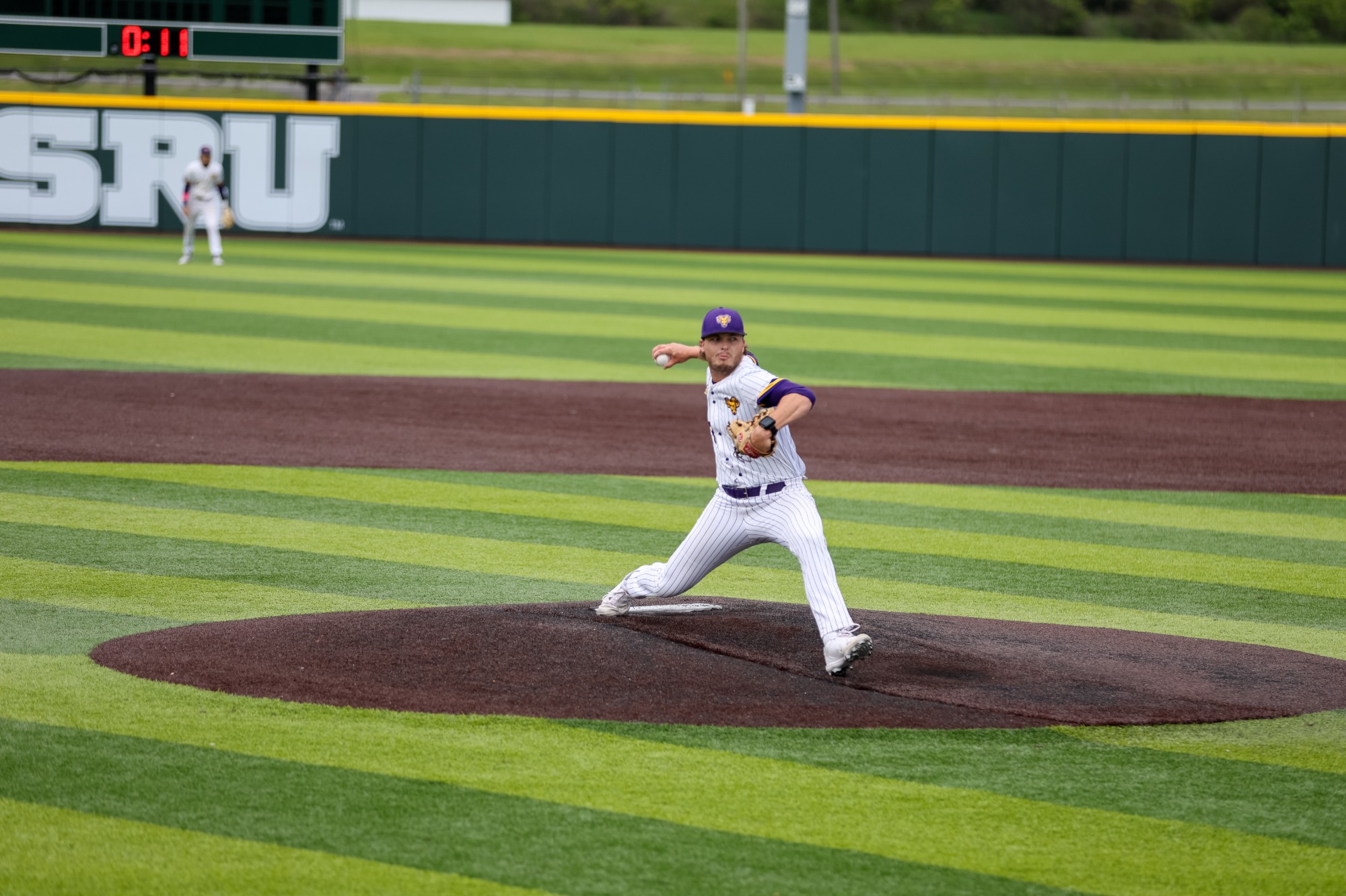 KYLE LAZER WEARING WHITE PINSTRIPES PITCHING VS IUP IN PSAC SEMIFINALS