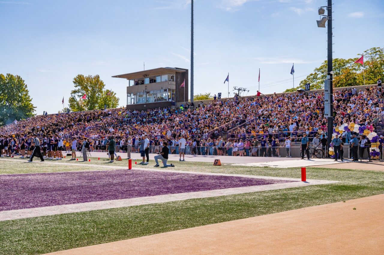 WIDE SHOT OF HOME FARRELL STADIUM CROWD AT SETON HILL HOME OPENER ON 9-20-26