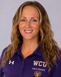 Alexis Versak head shot in purple polo
