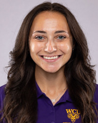 Ryan Curley head shot in purple polo