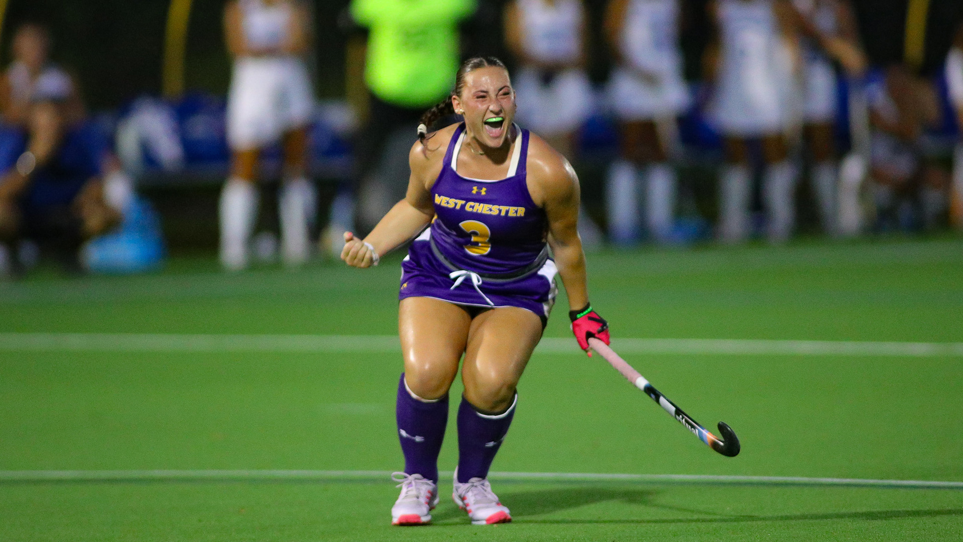 Anna Finn celebrates one of her four goals on the evening at Vonnie Gros Field dressed in the Golden Rams' home purple uniforms with gold and white trim.