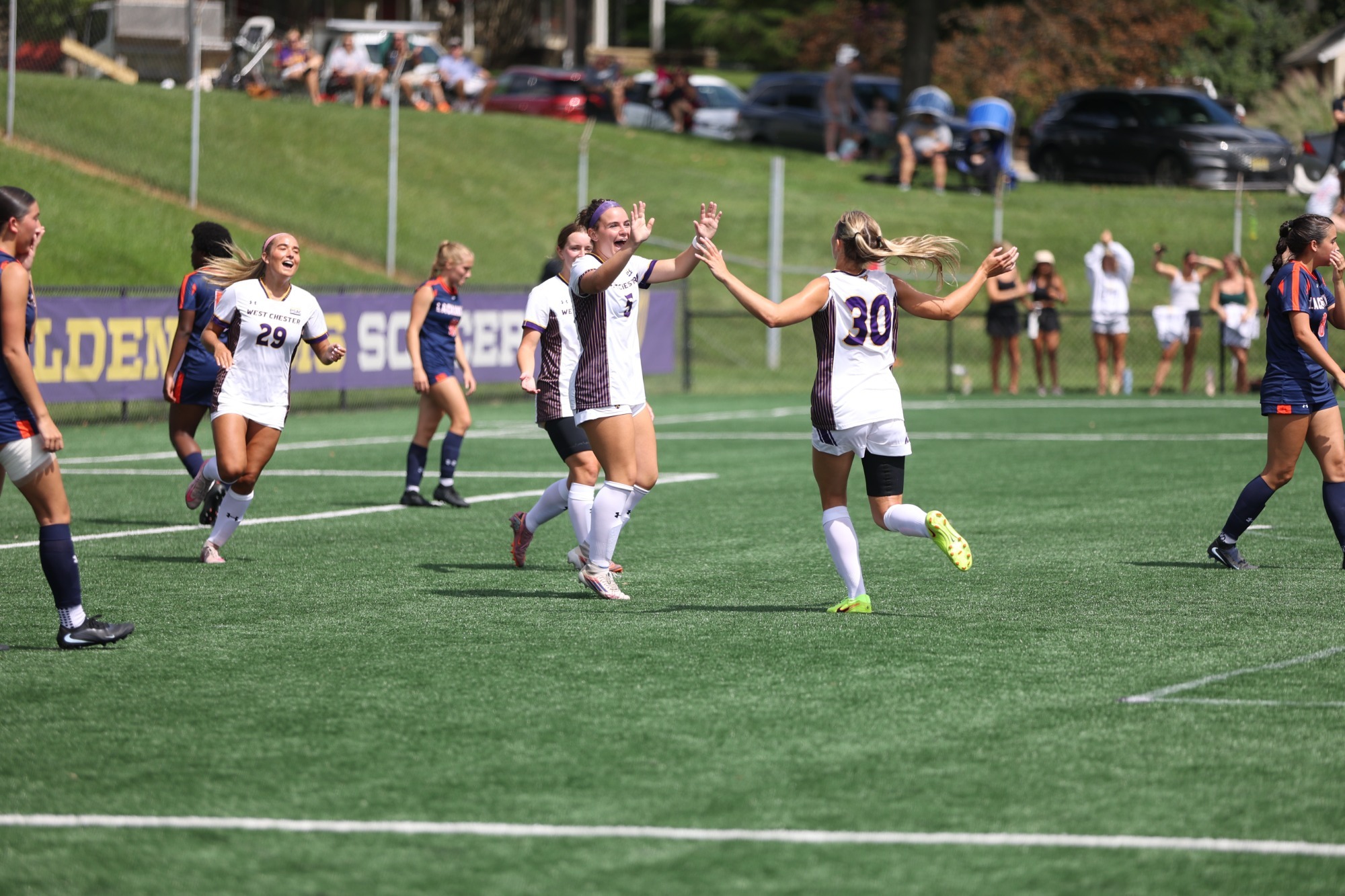 EMMA SUHOSKI WEARING HOME WHITE KIT CELEBRATES ONE OF HER TWO GOALS VS LACKAWANNA ON SATURDAY AFTERNOON