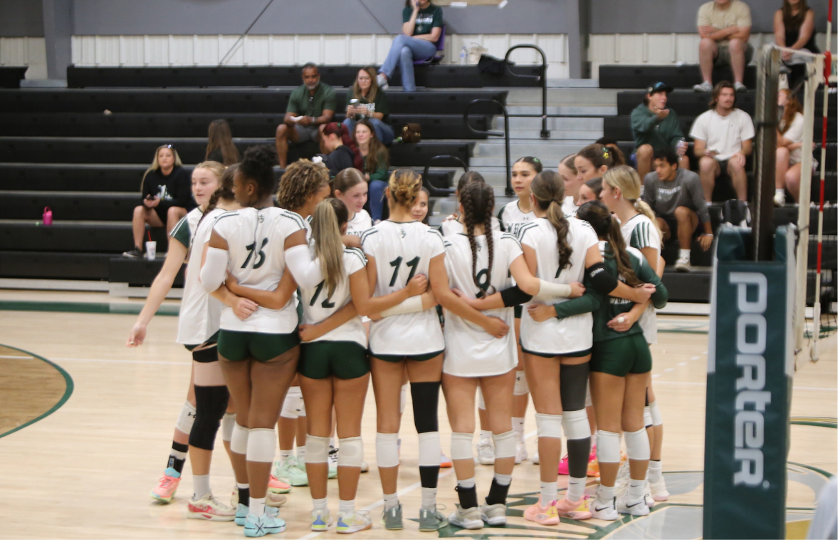 Volleyball pregame huddle against St. Thomas