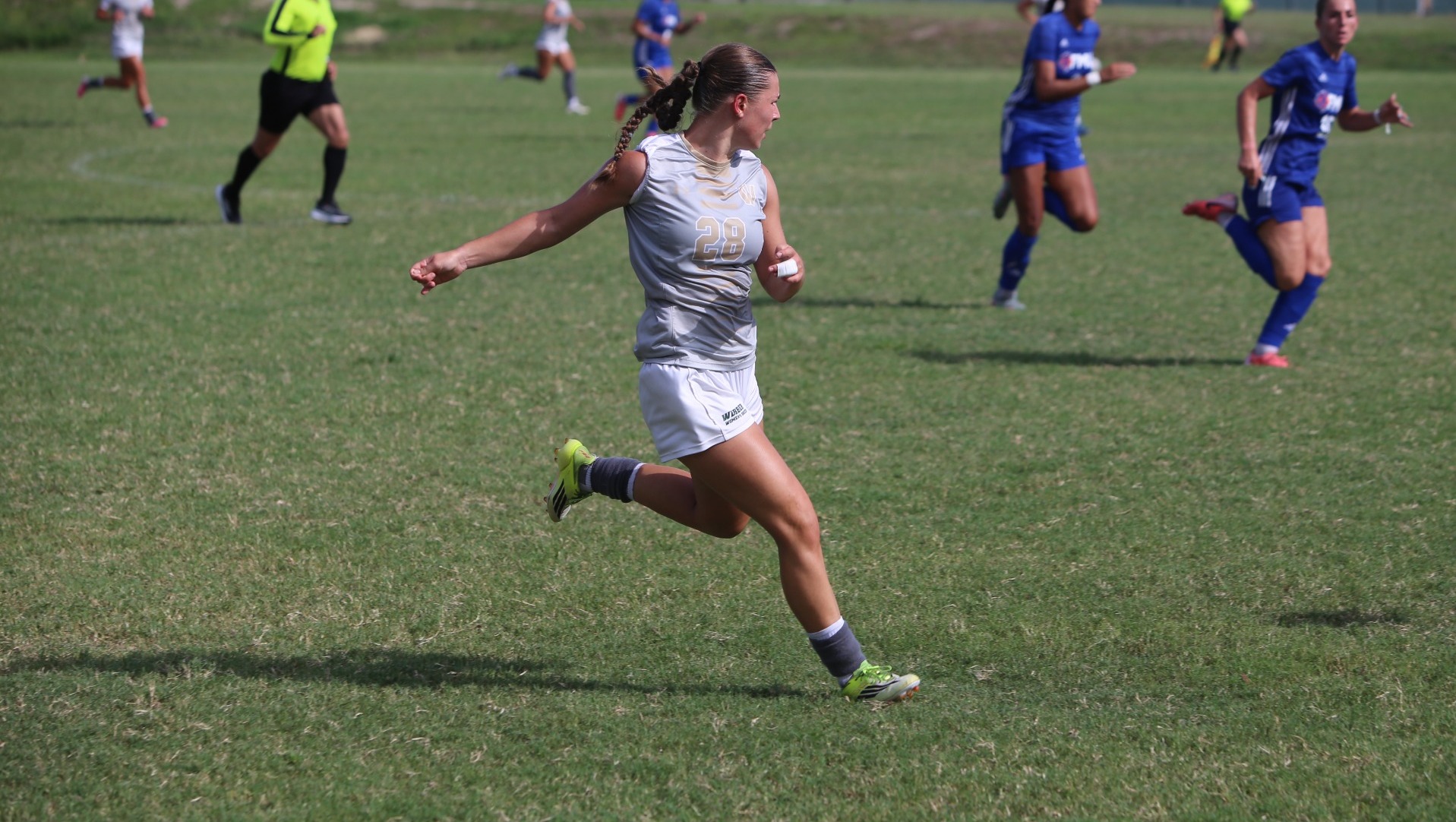 Sophia Schlager  hitting the ball toward the goal