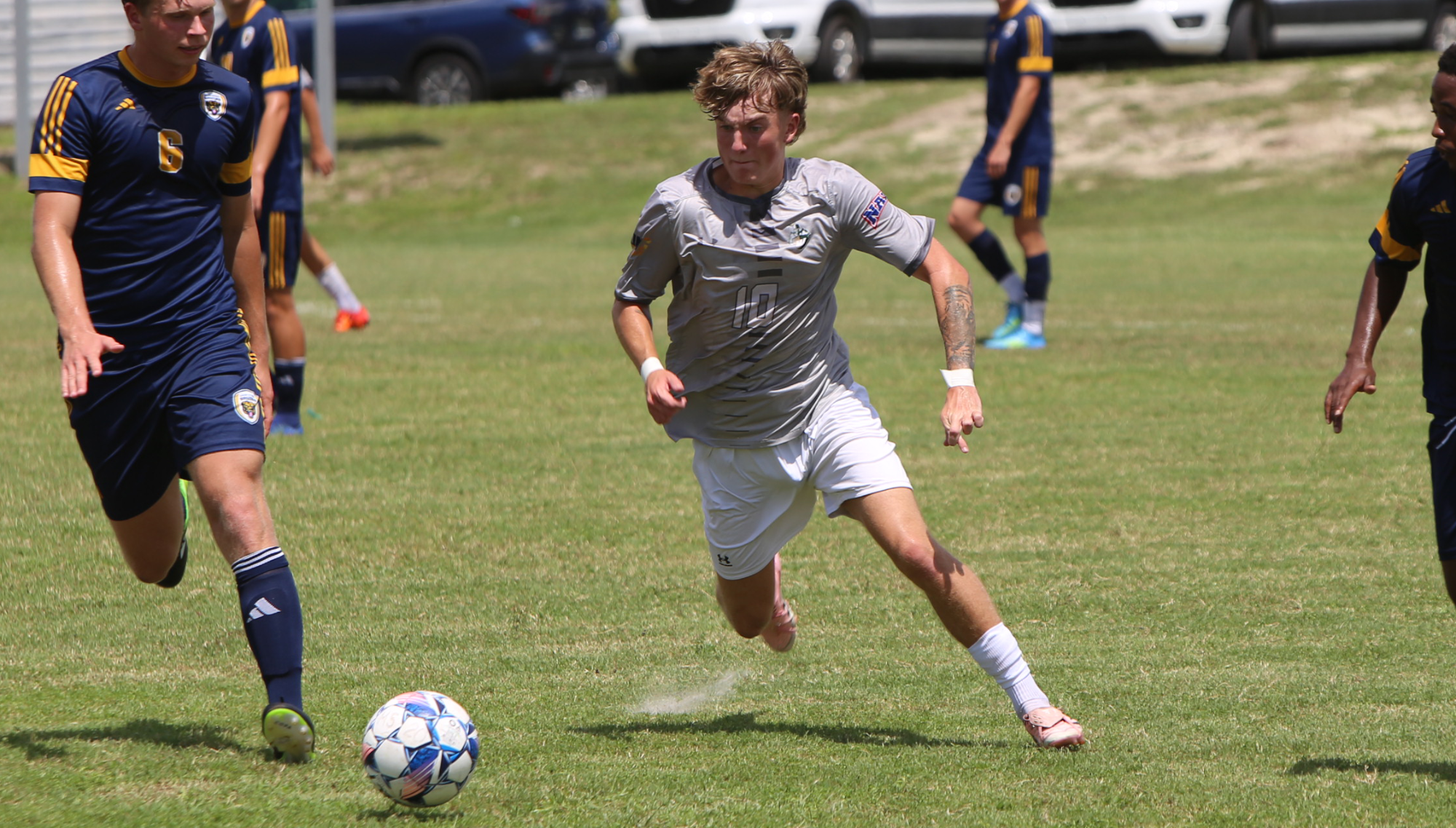 Aaron Chalmers, Jack attacking the ball against Carolina University