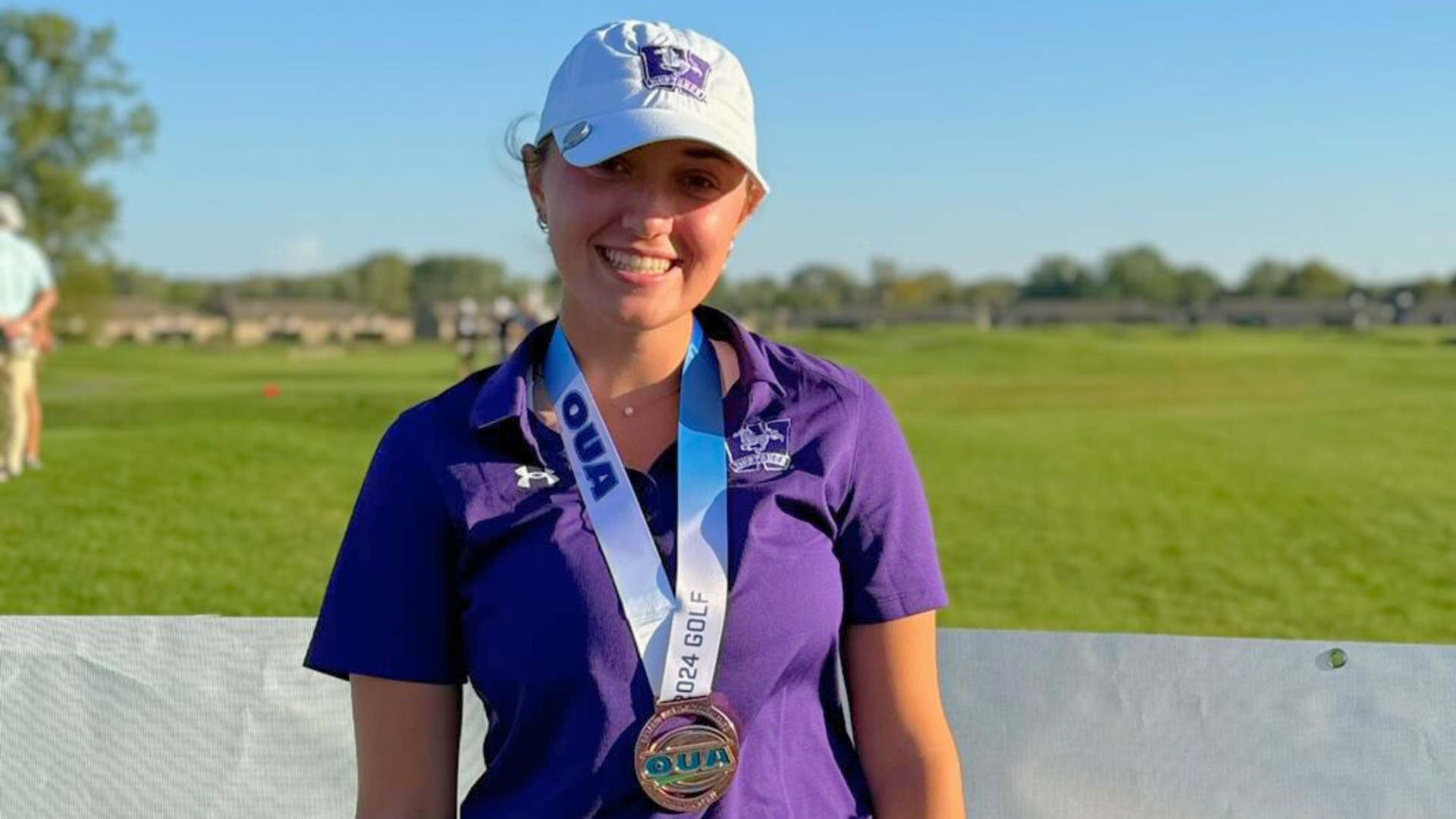 Kira Turner with bronze medal from 2024 OUA Golf Championship