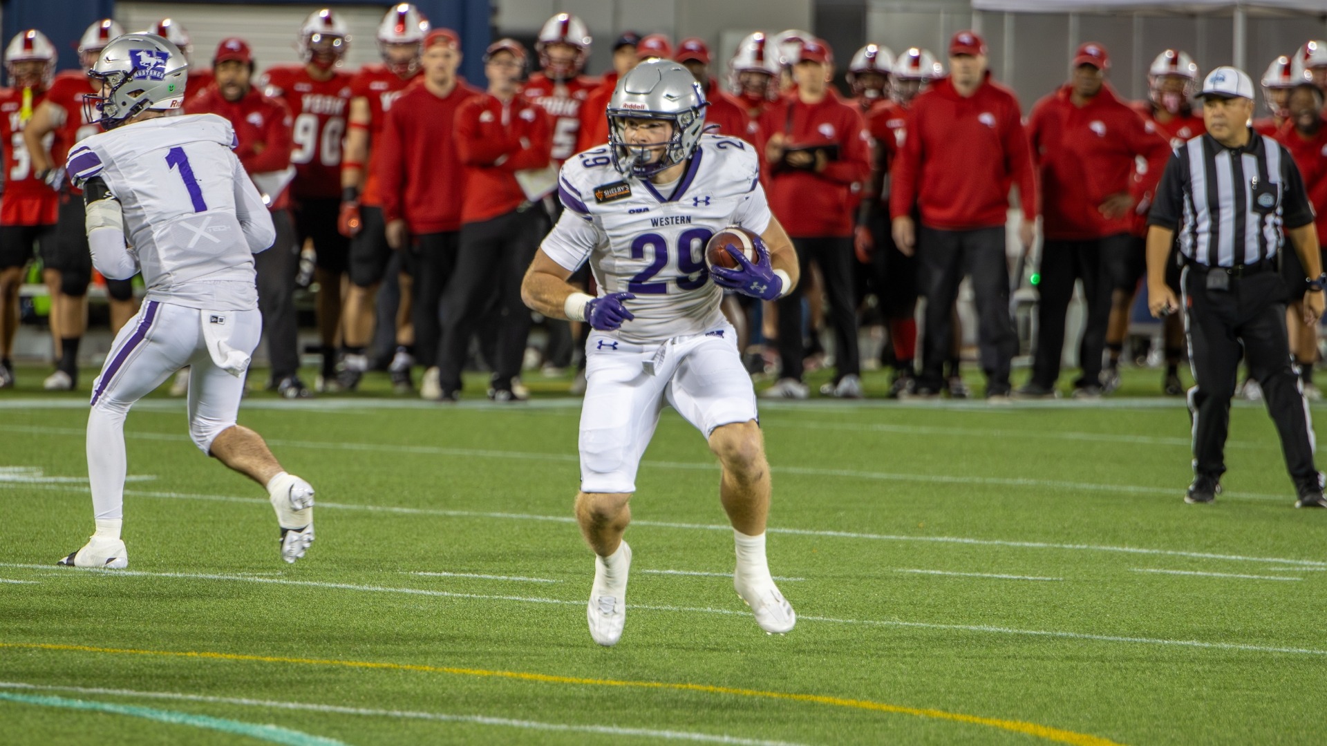 Ethan Dolby runs the ball against York