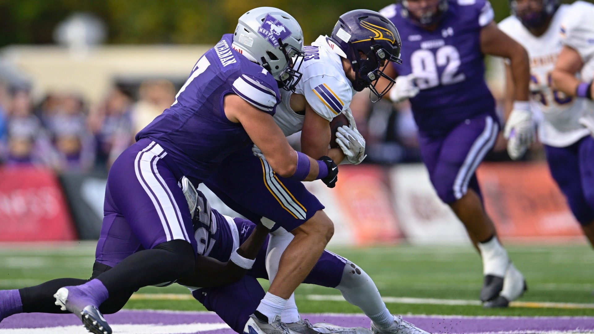 Jade Buchanan makes a tackle against Laurier