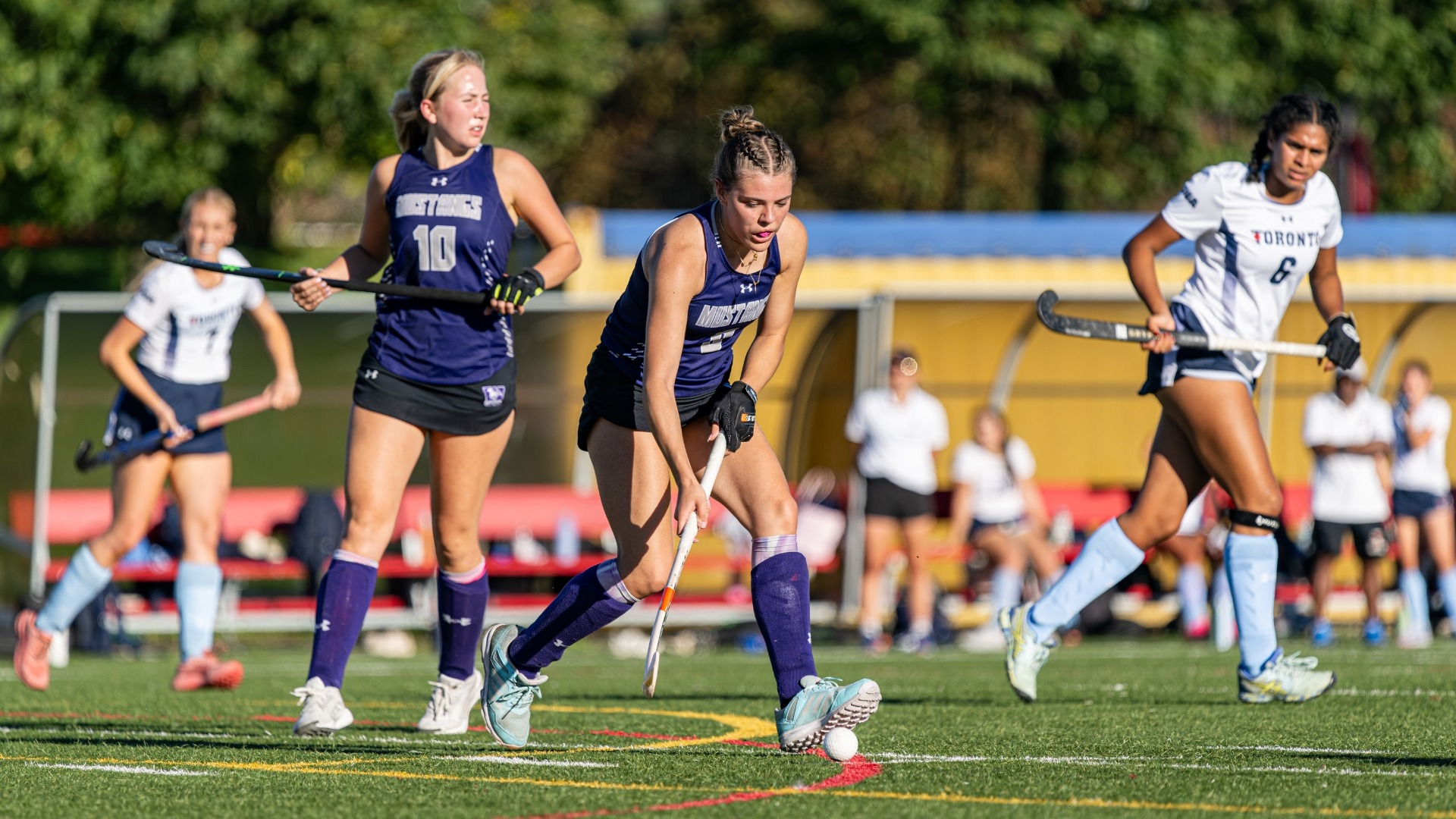 Field Hockey plays the ball against Toronto