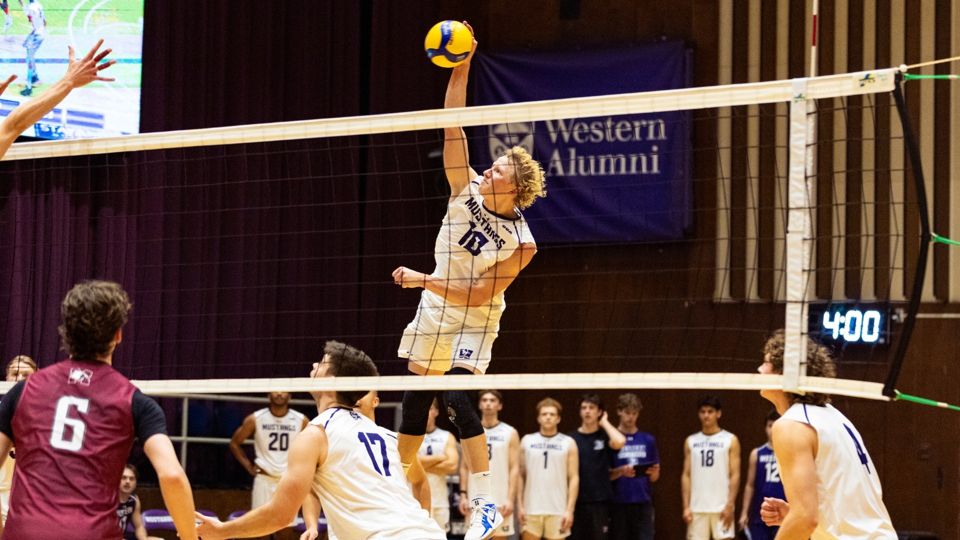 Jayden Talsma plays the ball against McMaster