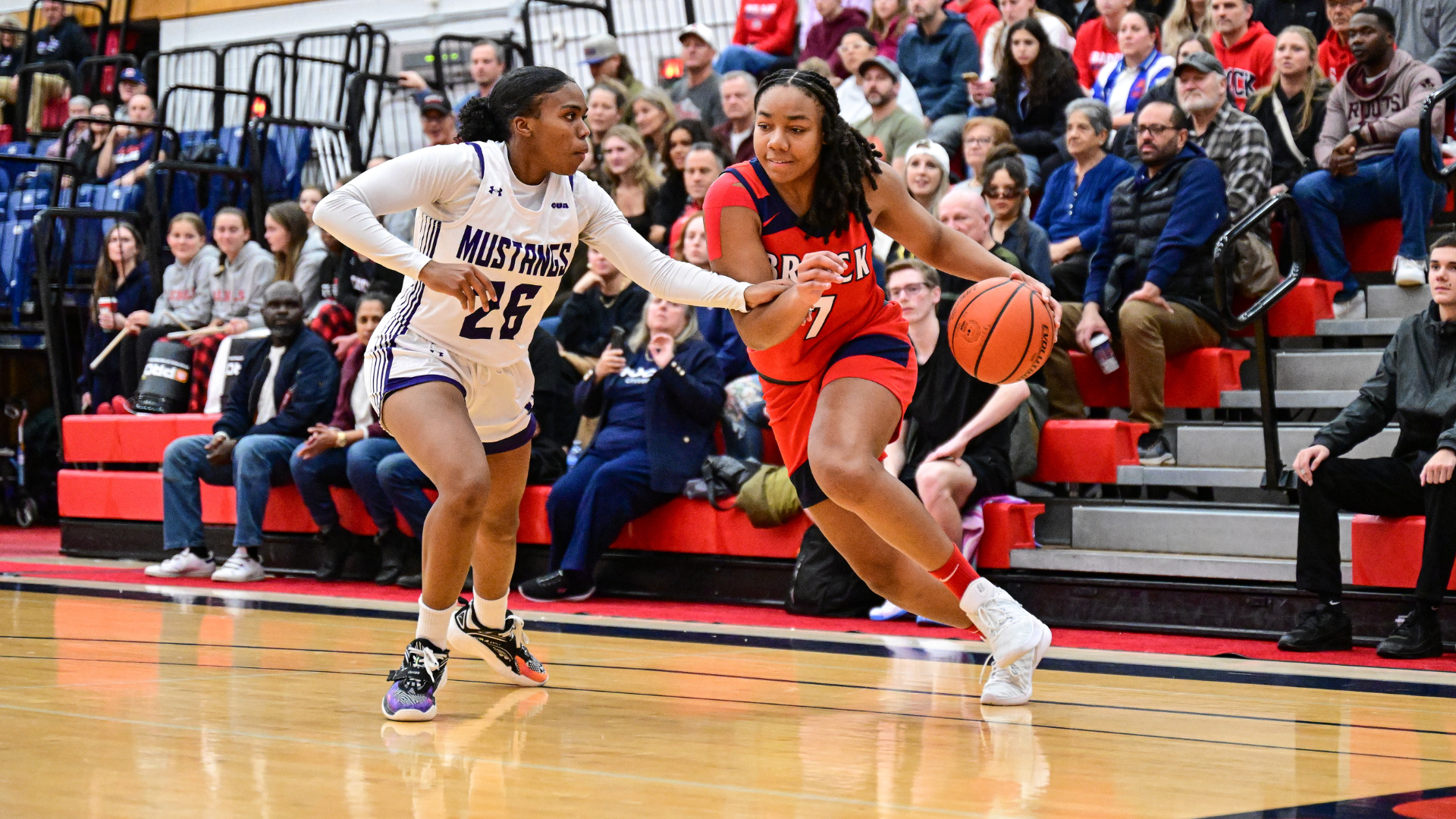 Paris Alexander defends against Brock