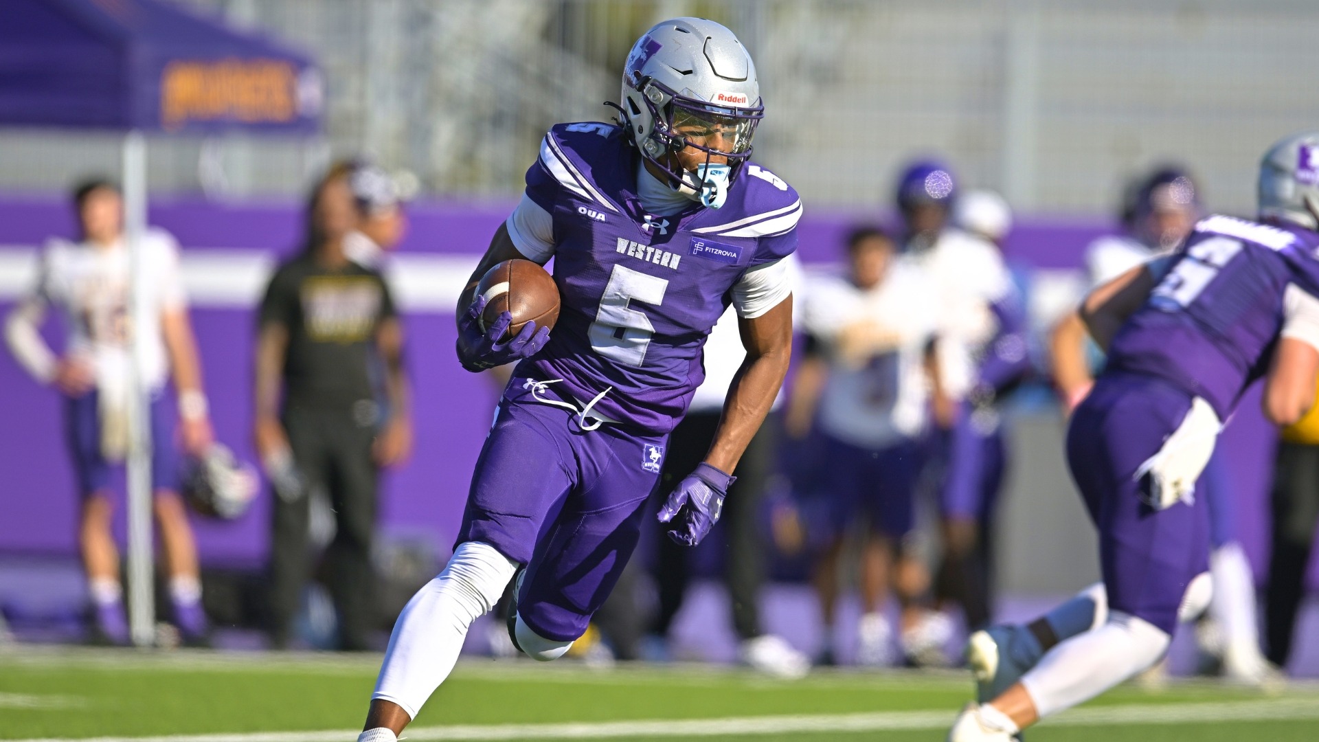 Dasani McIntosh runs the ball against Laurier - Oct. 24 2026