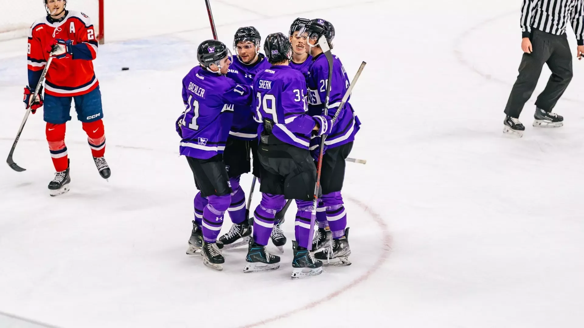 Men's Hockey celebrates a goal against Brock - Oct 24 2026