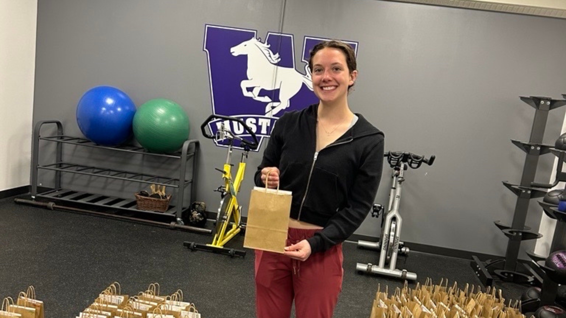 Mustangs Wellness Leads Photo of a student athlete putting together student athlete packages