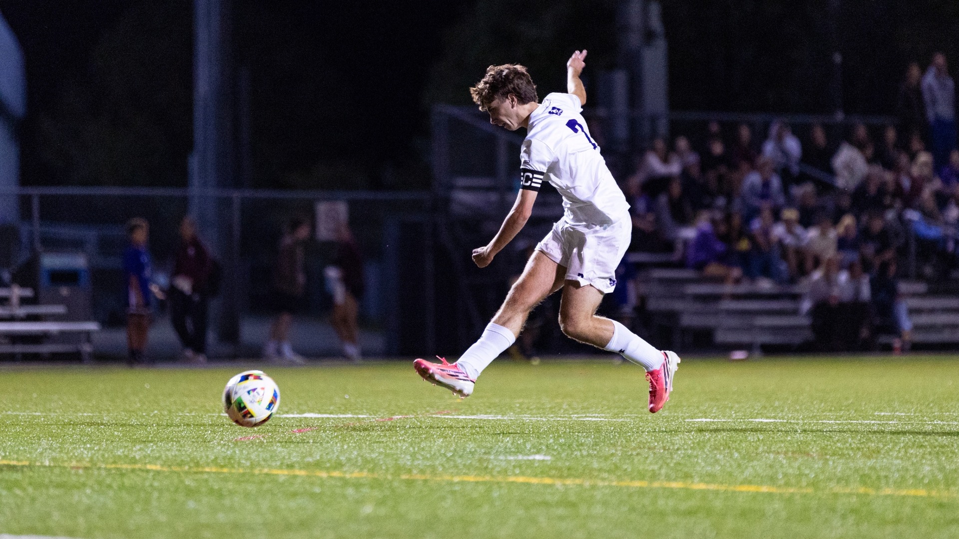 Callum Yuille kicks the ball against McMaster