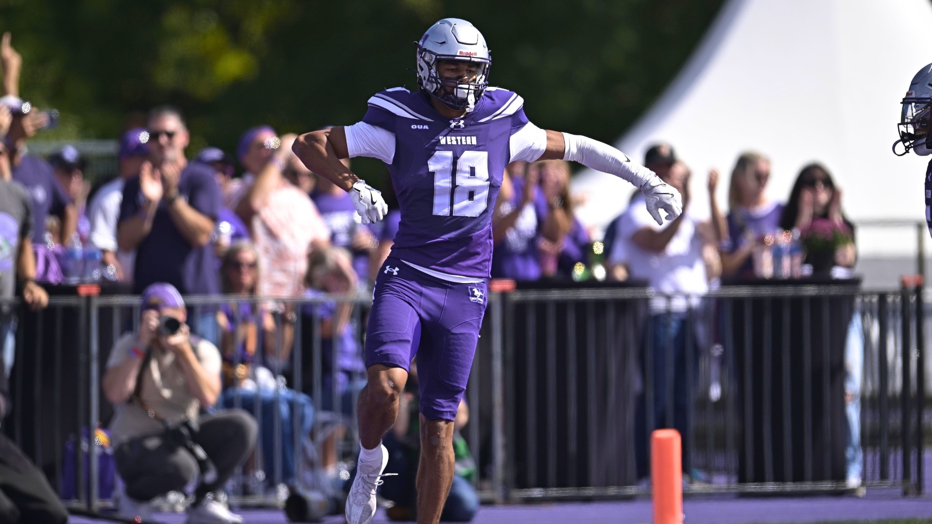 Emmett Charles celebrates after a touchdown against McMaster