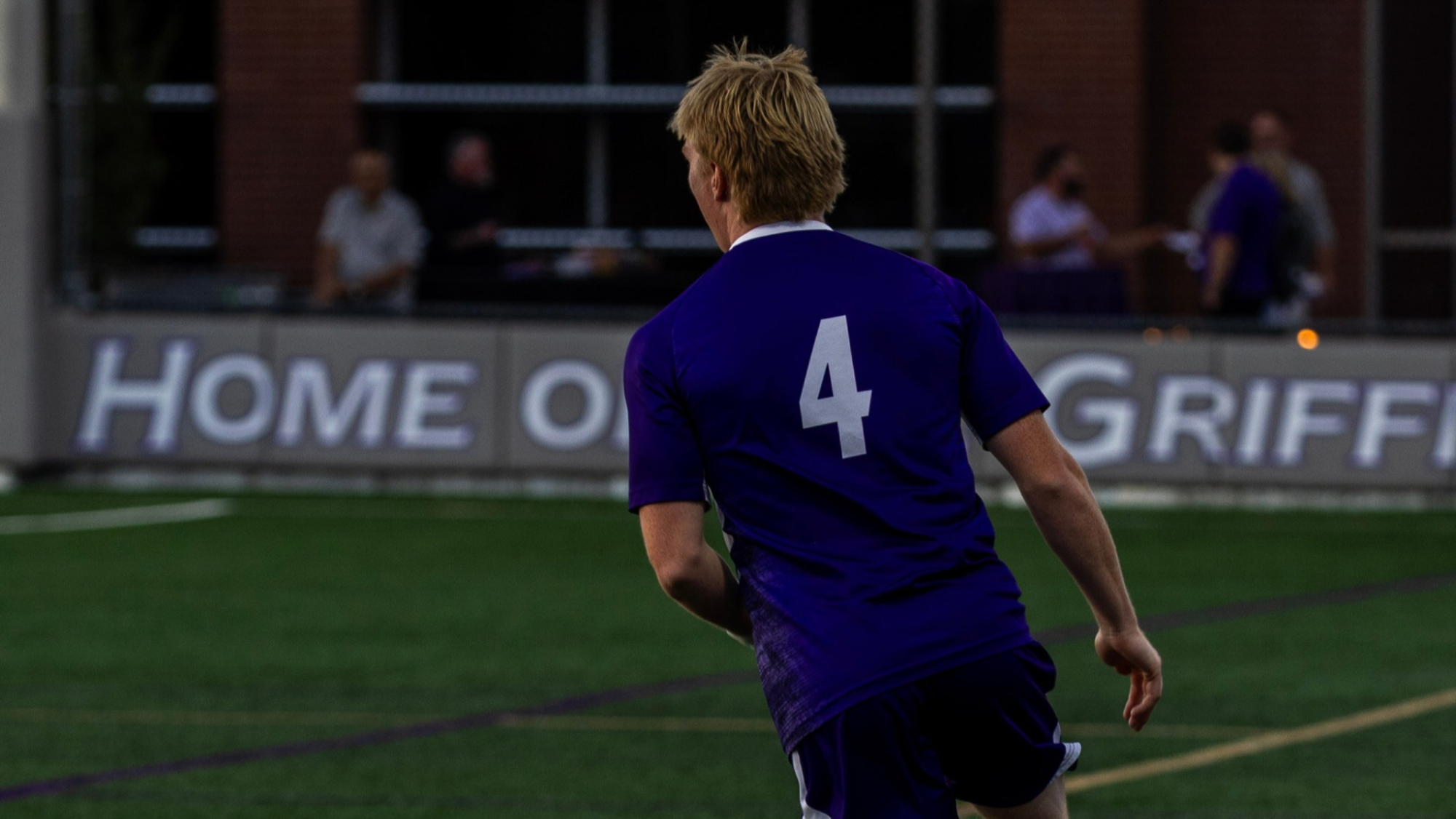 Gage Wood Dribbling up Field