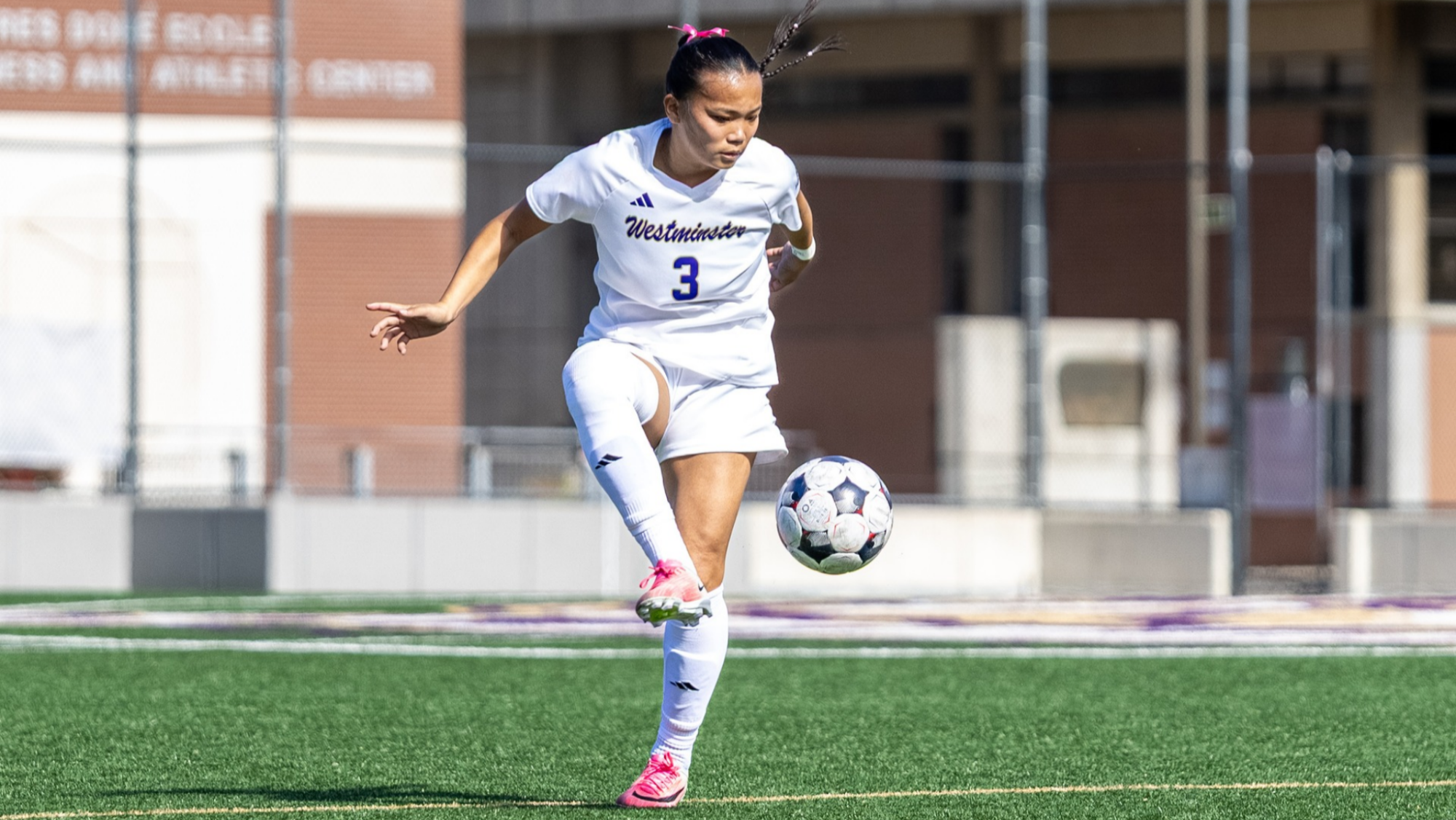 Kayla Sato controlling the ball