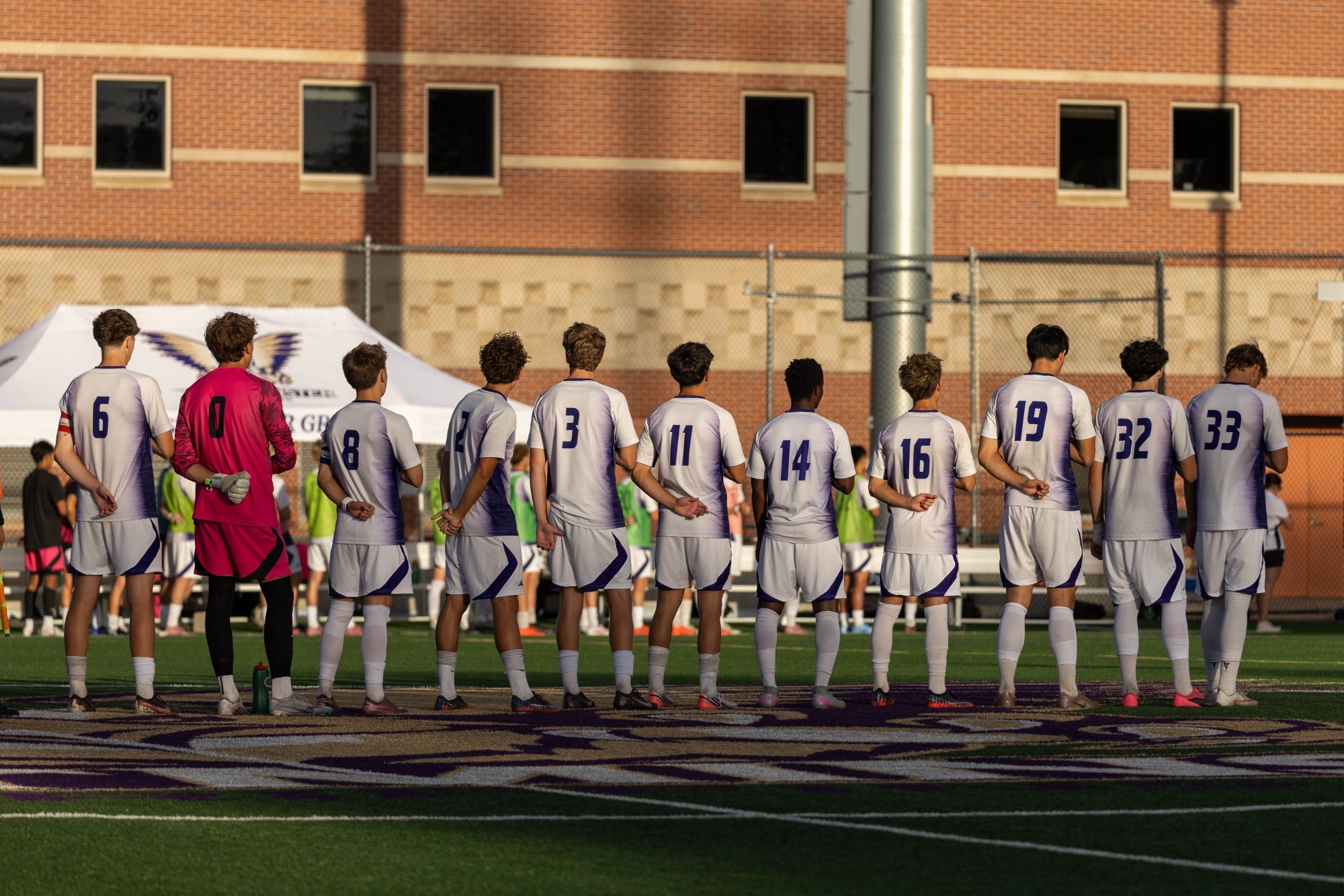MSOC standing for national anthem